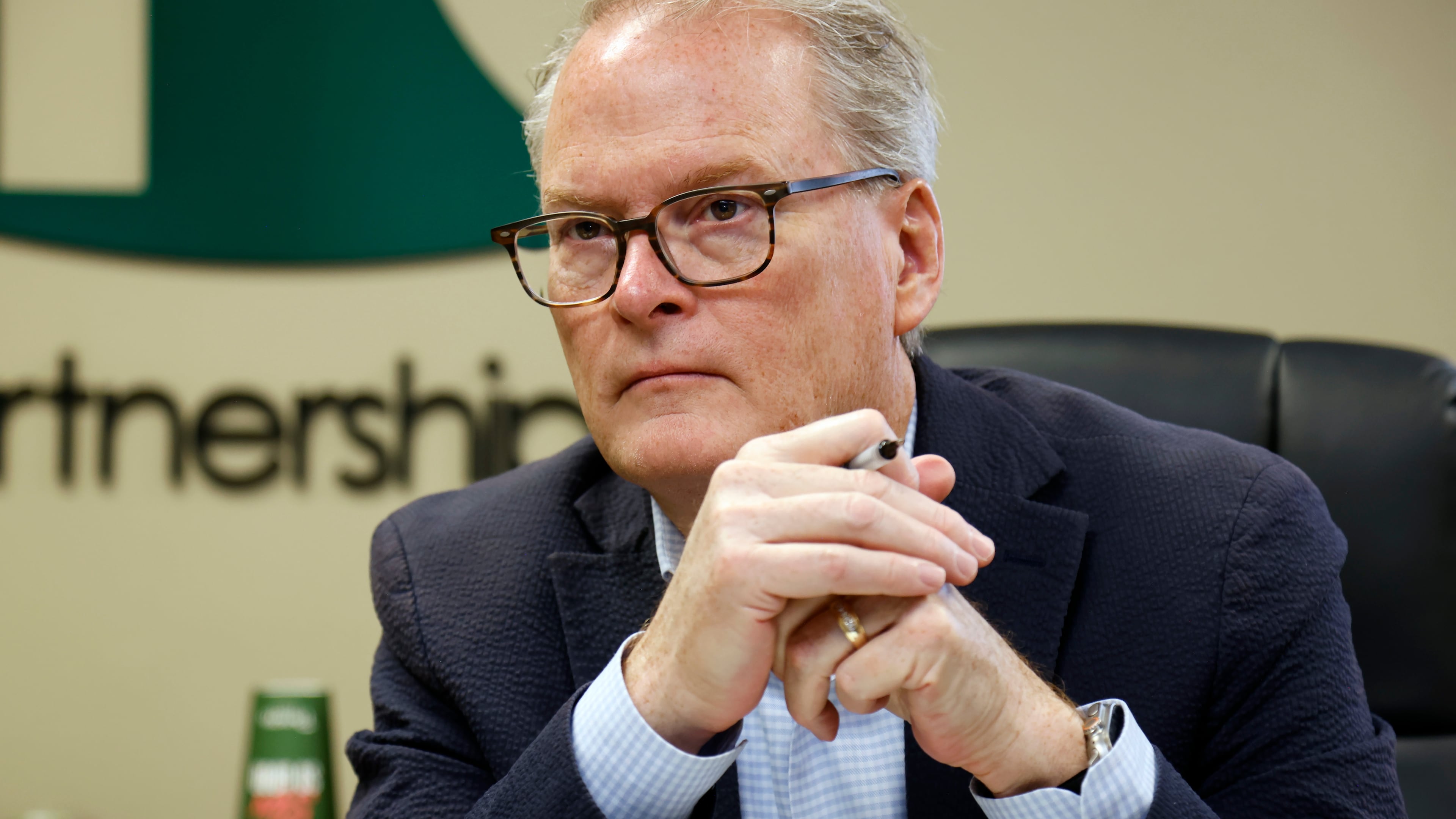 FILE - Democratic U.S. senatorial candidate Adam Hamilton of Kansas, listens to administrators at the Health Partnership Clinic as they discuss funding issues the low-income family medical facility is facing on Wednesday, Aug. 12, 2026, in Olathe. Kan. (AP Photo/Colin E. Braley, File)