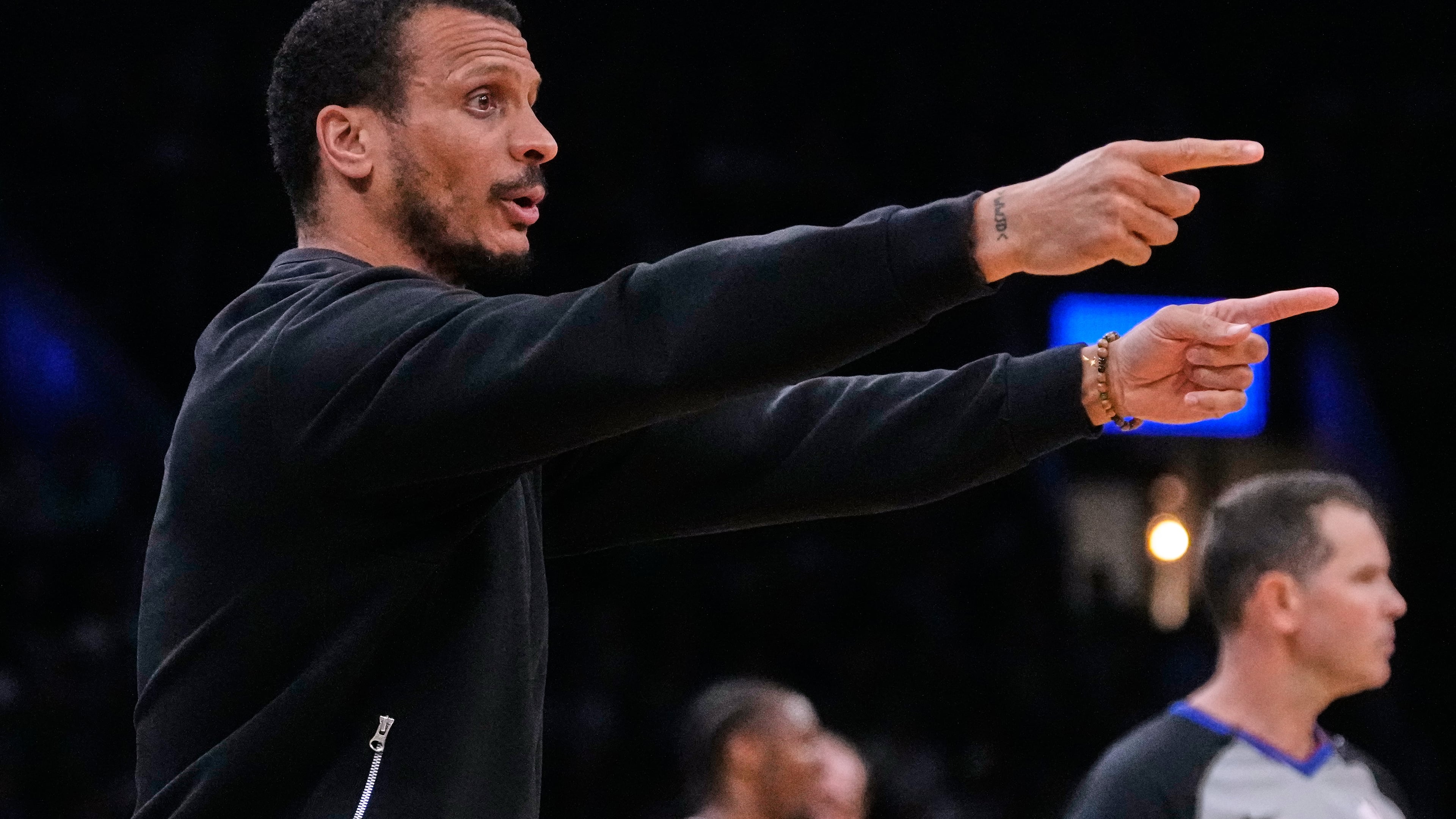 Boston Celtics head coach Joe Mazzulla calls to his players during the first half of Game 5 of a first-round NBA playoffs basketball series against the Philadelphia 76ers, Tuesday, April 28, 2026, in Boston. (AP Photo/Charles Krupa)