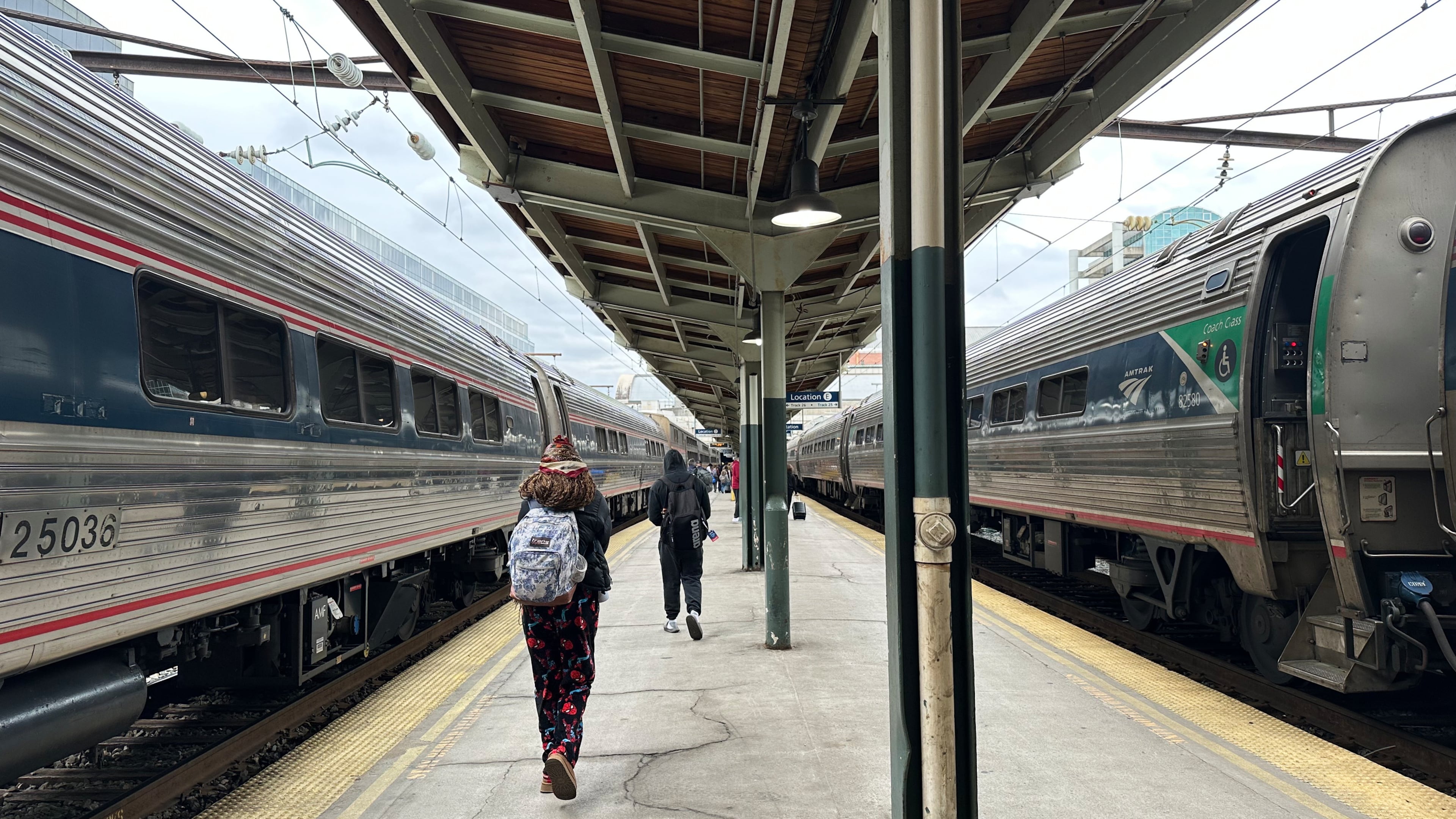 FILE - People walk through Union Station on March 27, 2026, in Washington. (AP Photo/Bill Barrow, File)
