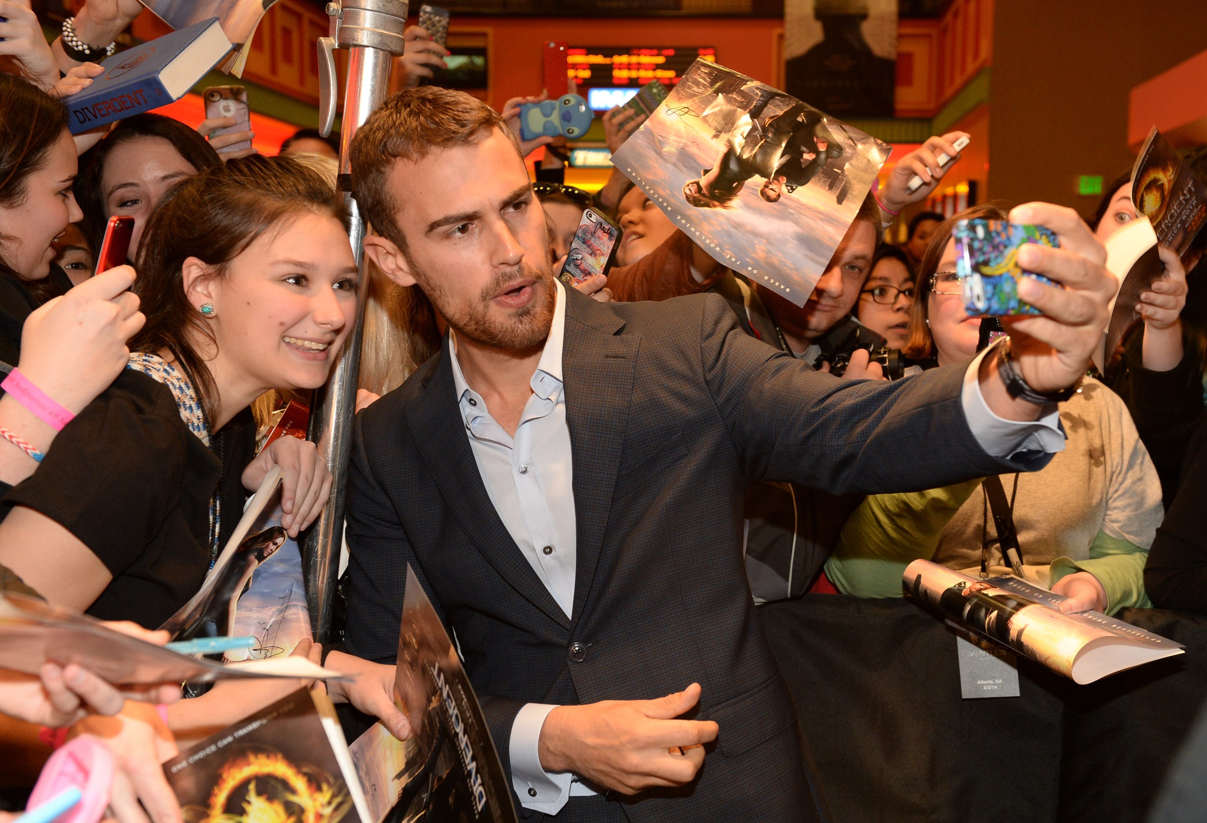 Actor Theo James makes an appearance at a screening of "Divergent" March 3, 2014 at Regal Atlantic Station in Atlanta.