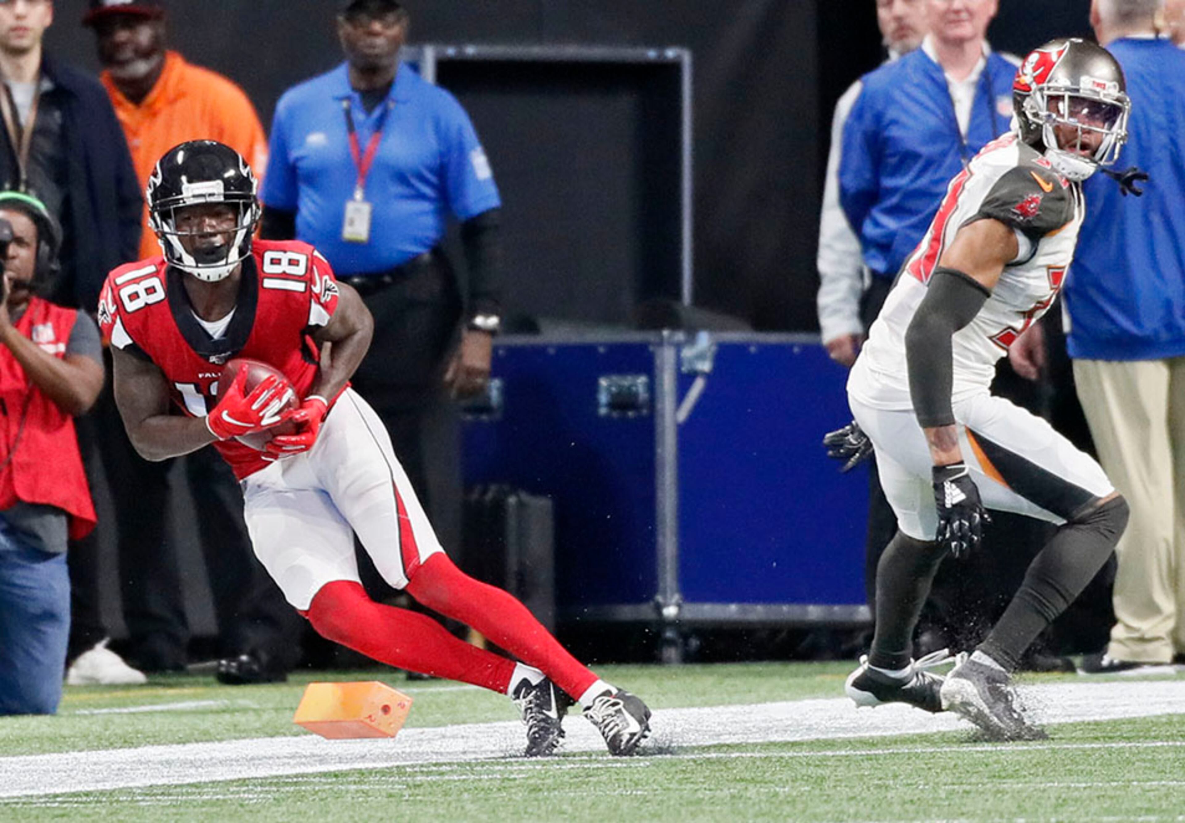 Falcons wide receiver Calvin Ridley catches a pass from Matt Schaub in the end zone for the Falcons' final points of a 35-22 loss to Tampa Bay Sunday, Nov. 24, 2019, at Mercedes-Benz Stadium in Atlanta.