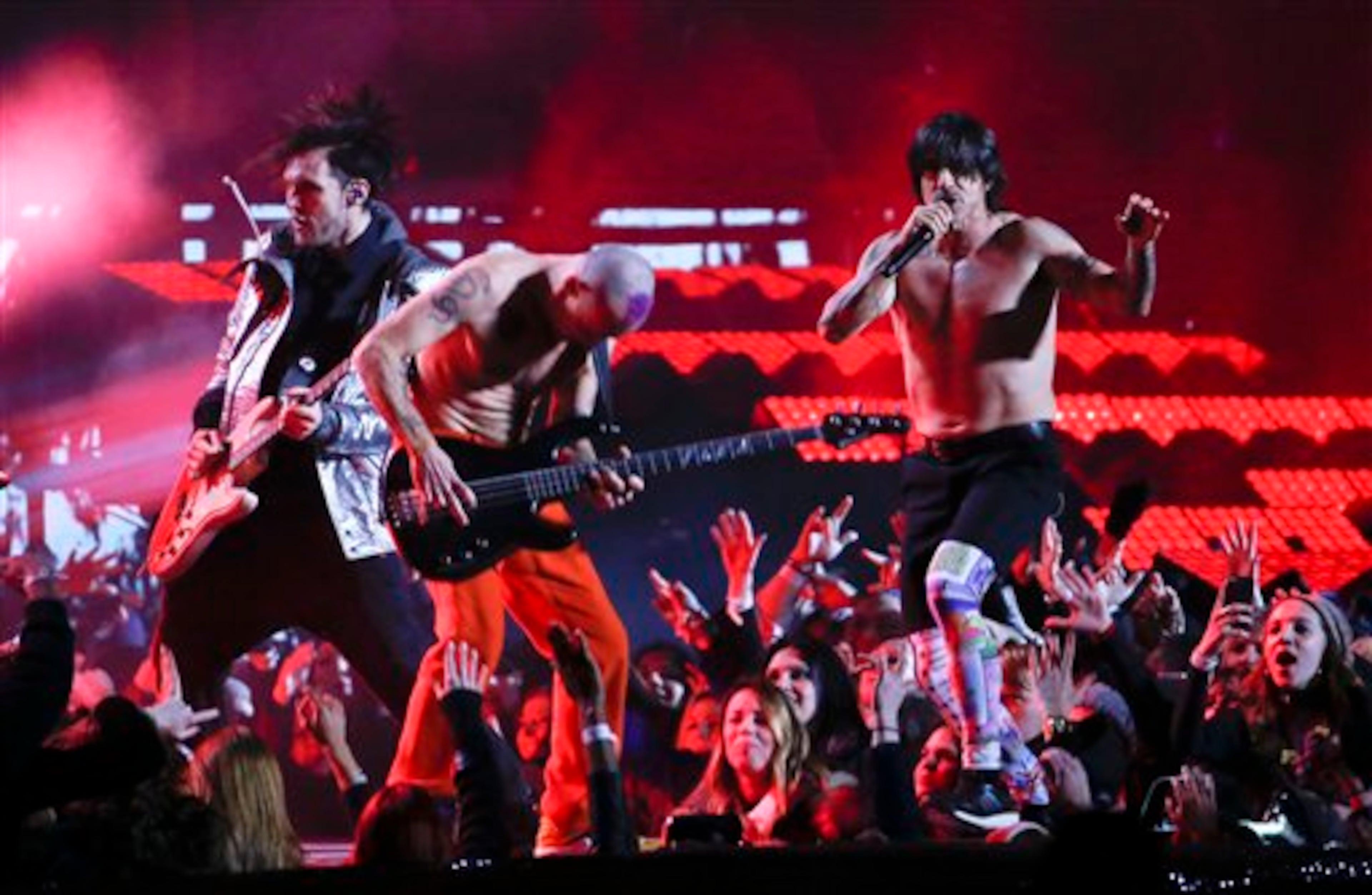 The Red Hot Chili Peppers perform during the halftime show of the NFL Super Bowl XLVIII football game between the Seattle Seahawks and the Denver Broncos Sunday, Feb. 2, 2014, in East Rutherford, N.J. (AP Photo/Matt York)