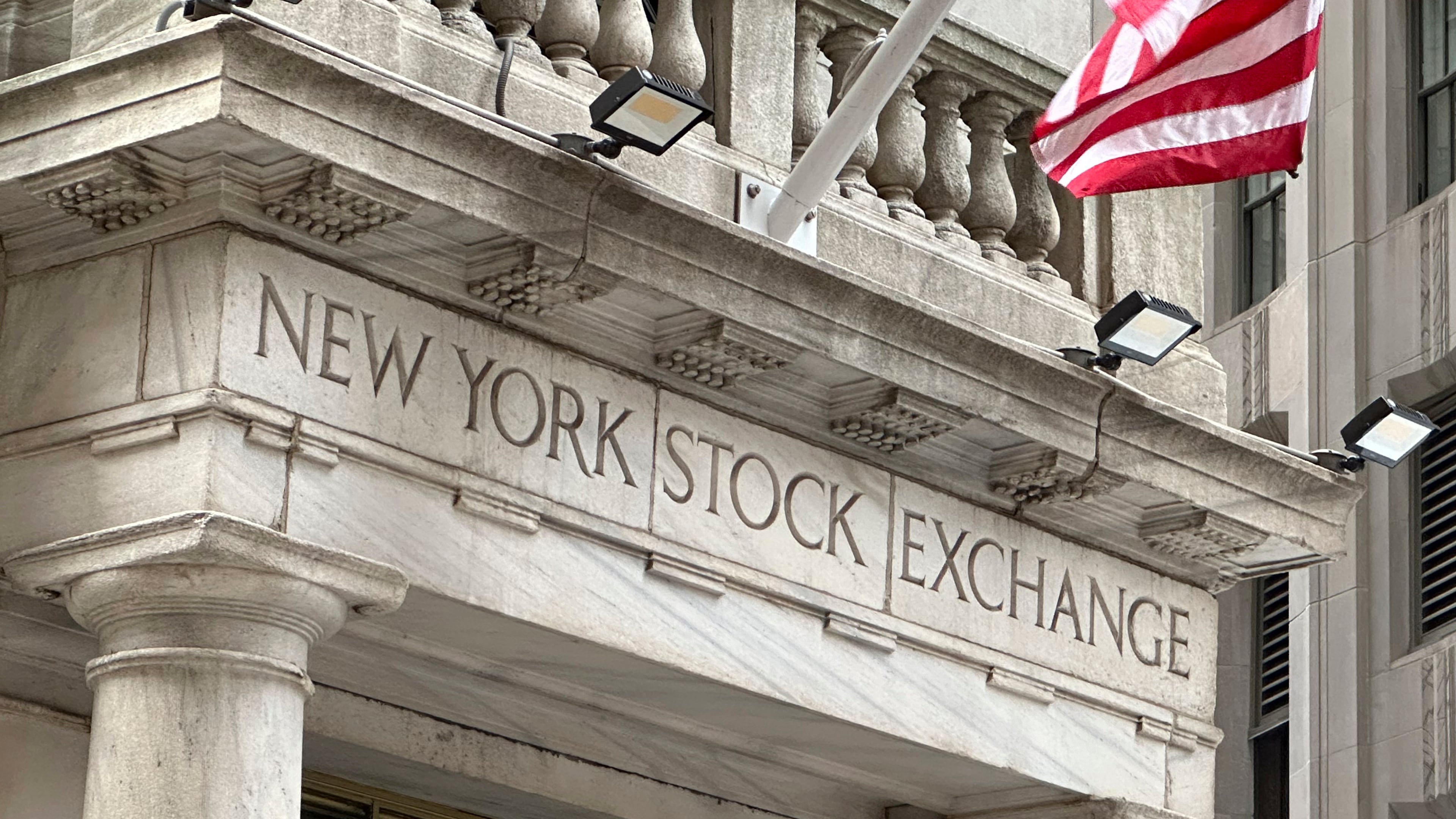 FILE - An entrance to the New York Stock Exchange is shown on June 26, 2024, in New York. (AP Photo/Peter Morgan, File)