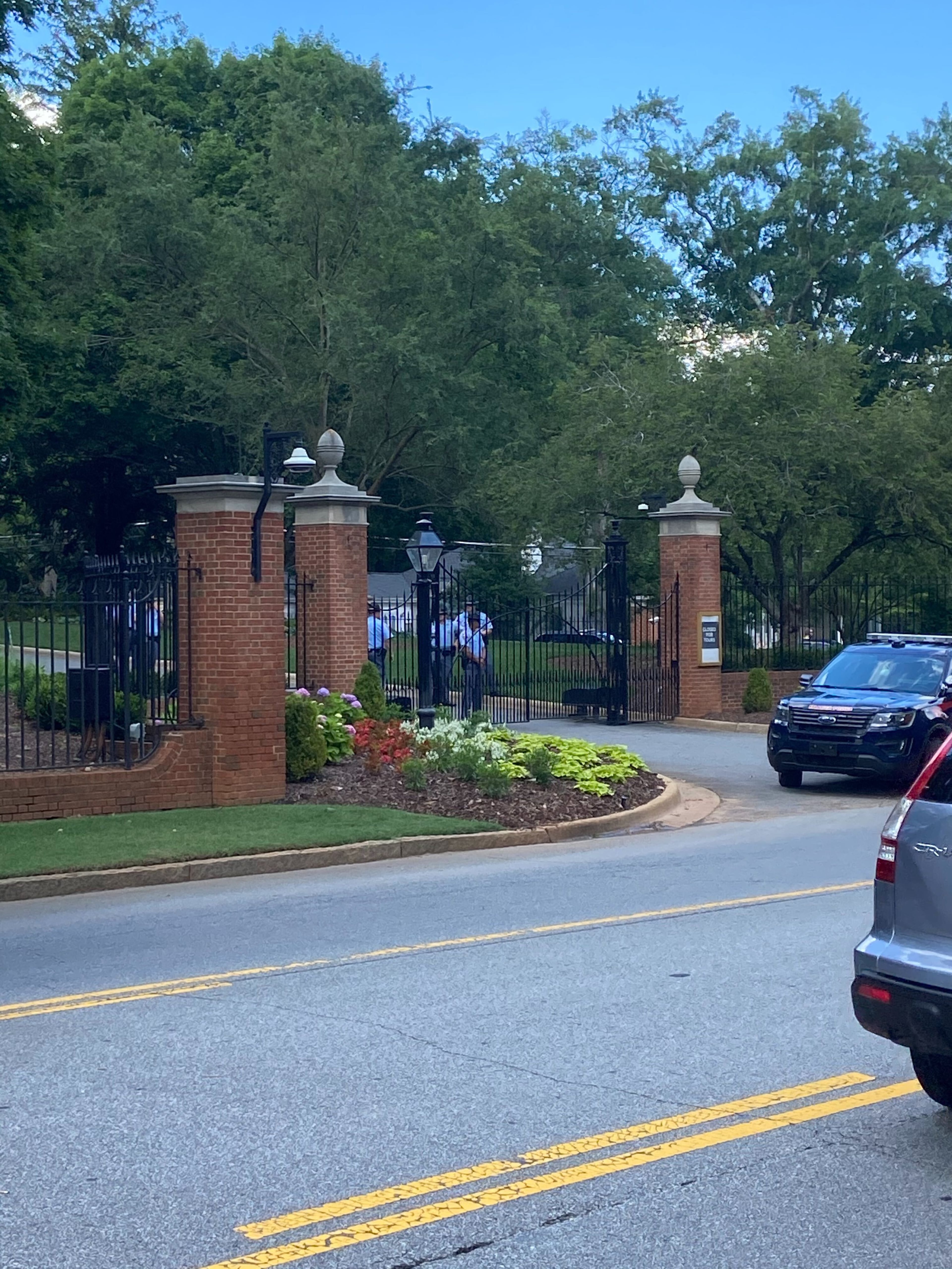 Saturday, May 30 -- About a hundred protesters gathered across the street from the Governor's Mansion in Buckhead. AJC Photo: Zachary Hansen