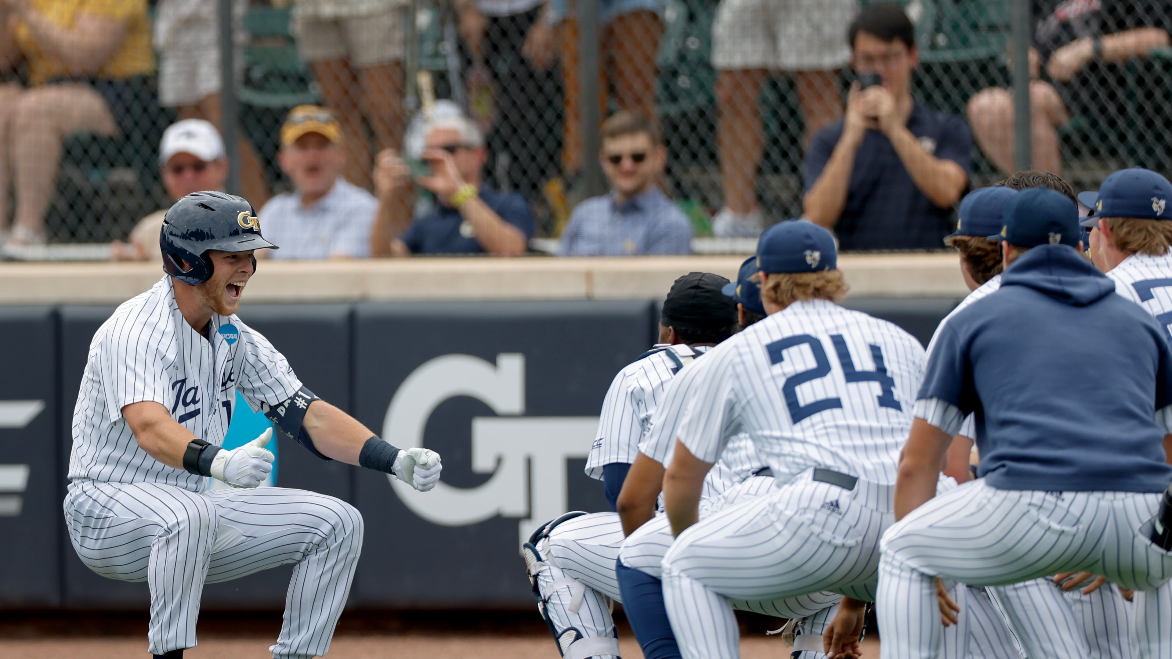 Georgia TechÕs Parker Brosius, left, celebrates with teammates after his solo home run against the Illinois Chicago in the second inning of an NCAA D1 Atlanta Regional baseball game at Russ Chandler Stadium, Friday, May 29, 2026, in Atlanta. (Erik S. Lesser for the AJC)