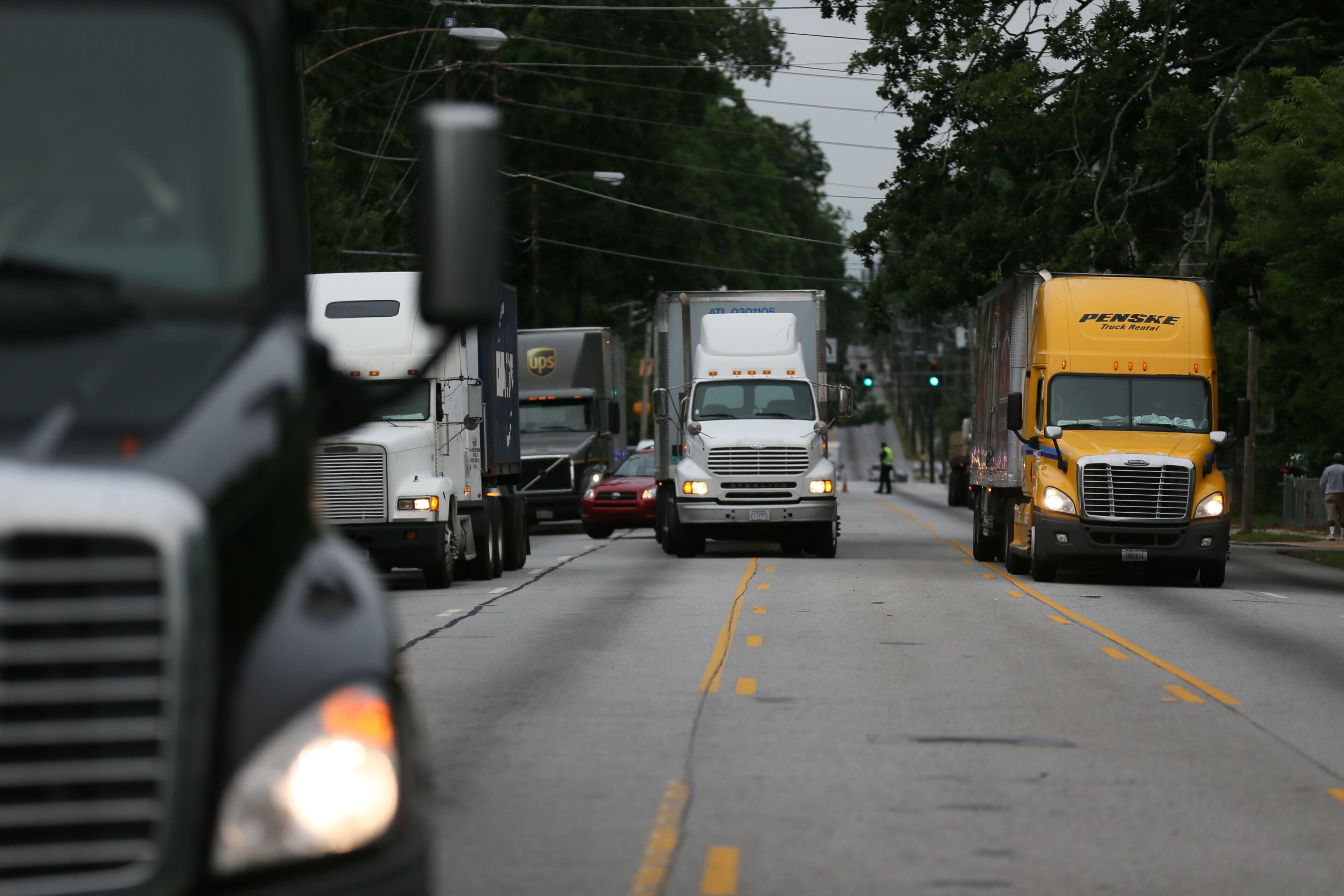 All lanes of Moreland Avenue were blocked Friday morning after a wreck involving an off-duty police officer. The MARTA officer was injured in the crash, which happened about 7 a.m. in the 600 block of Moreland near Pendleton Street, south of Glenwood Avenue. JOHN SPINK/JSPINK@AJC.COM