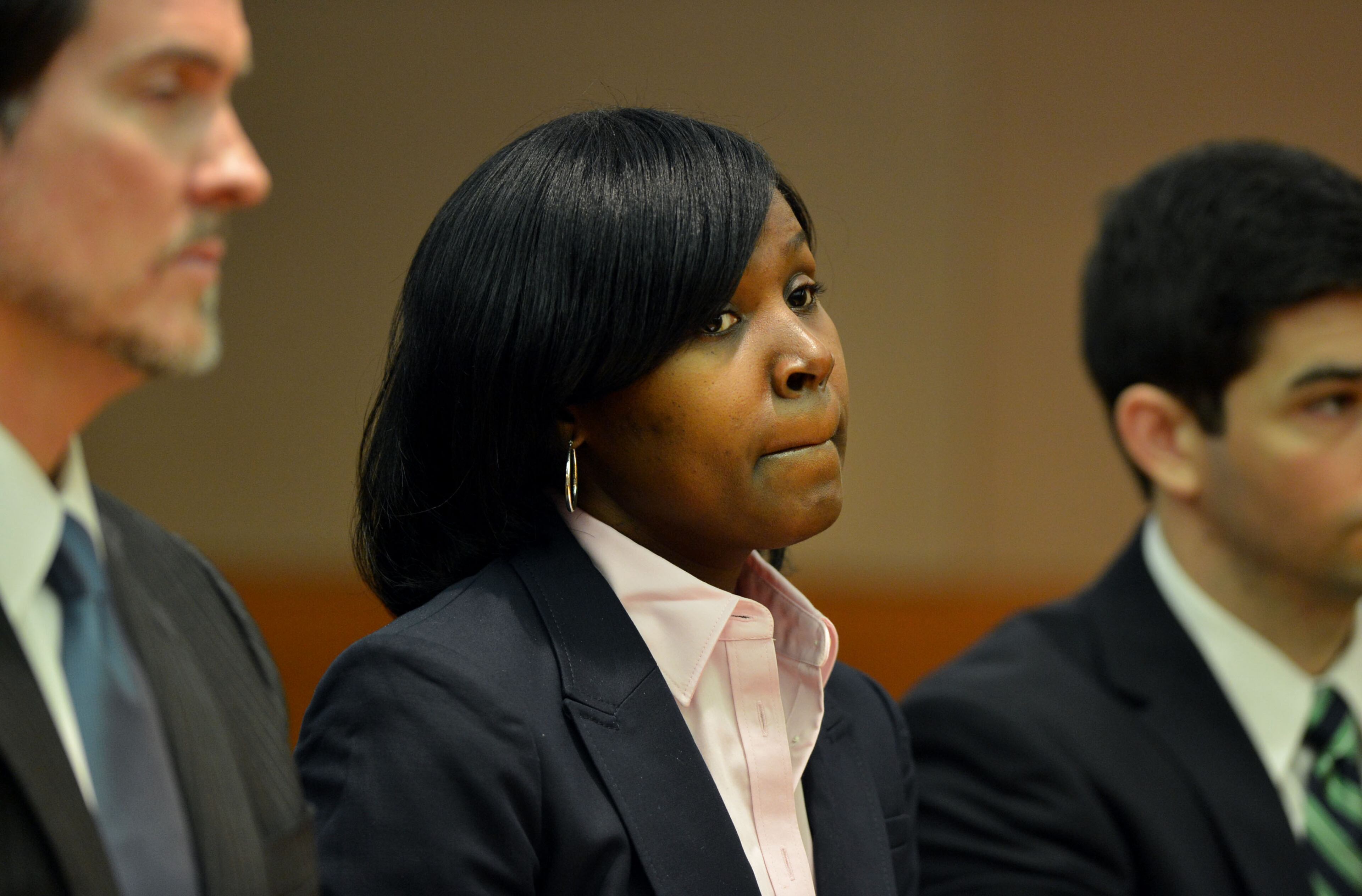 Sandra Ward, sits with her attorney Page Pate during the hearing. Ward, a former administrator at Parks Middle School, pleaded guilty to a reduced charge. She was sentenced to serve one year probation, repay $5,000 she received in bonus money, perform 250 hours of community service and cooperate with the prosecution. Educators in the Atlanta Public Schools cheating scandal enter pleas before Judge Jerry Baxter in Fulton County Superior Court Friday, February 21, 2014. Any defendants in the widespread Atlanta Public Schools cheating case who don't make guilty pleas by the end of Friday will likely go on trial this spring, including Superintendent Beverly Hall and senior members of her staff. KENT D. JOHNSON / KDJOHNSON@AJC.COM