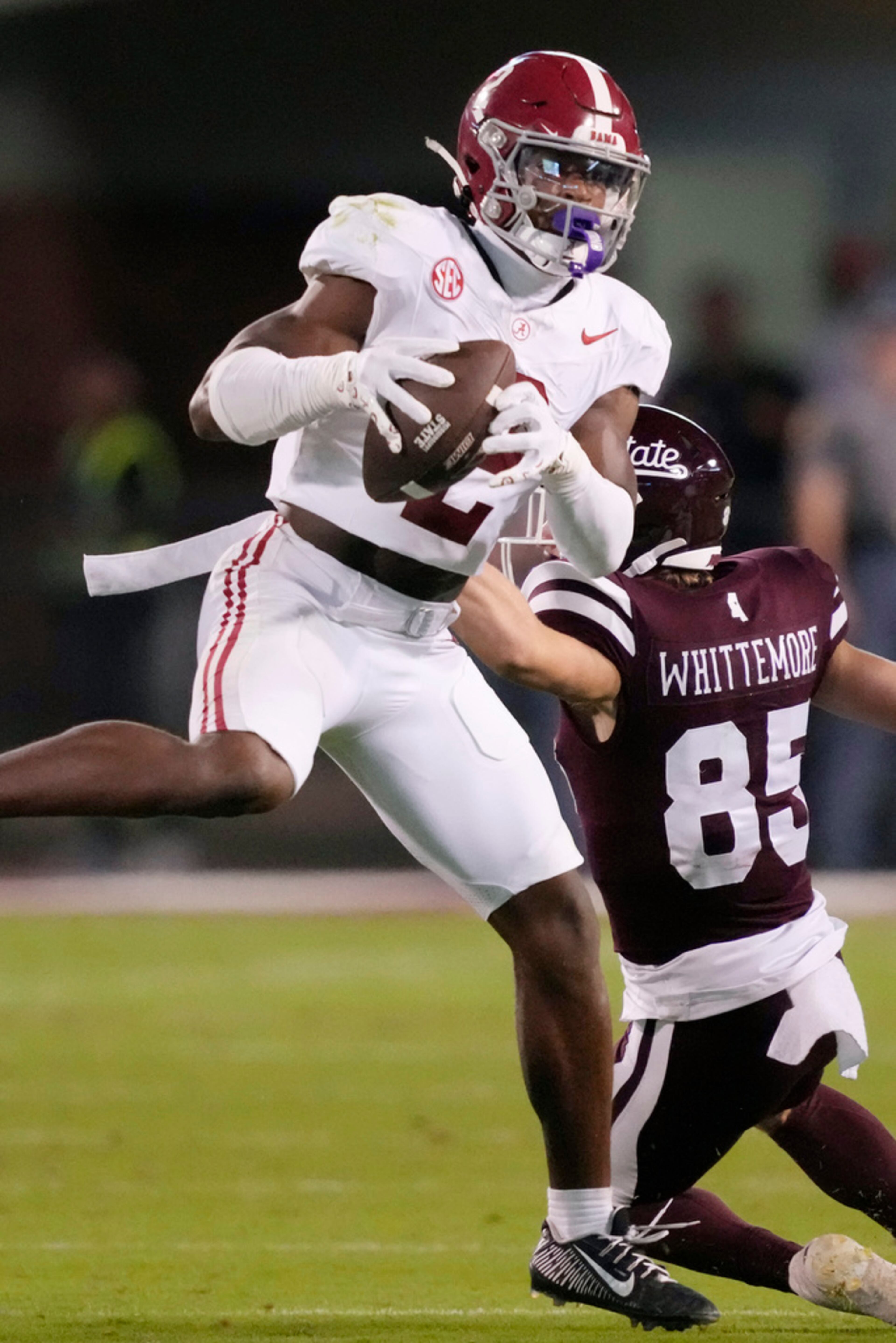 Alabama defensive back Caleb Downs (2) intercepts a pass intended for Mississippi State wide receiver Creed Whittemore (85) during the second half of an NCAA college football game, Saturday, Sept. 30, 2023, in Starkville, Miss. Alabama won 40-17. (AP Photo/Rogelio V. Solis)