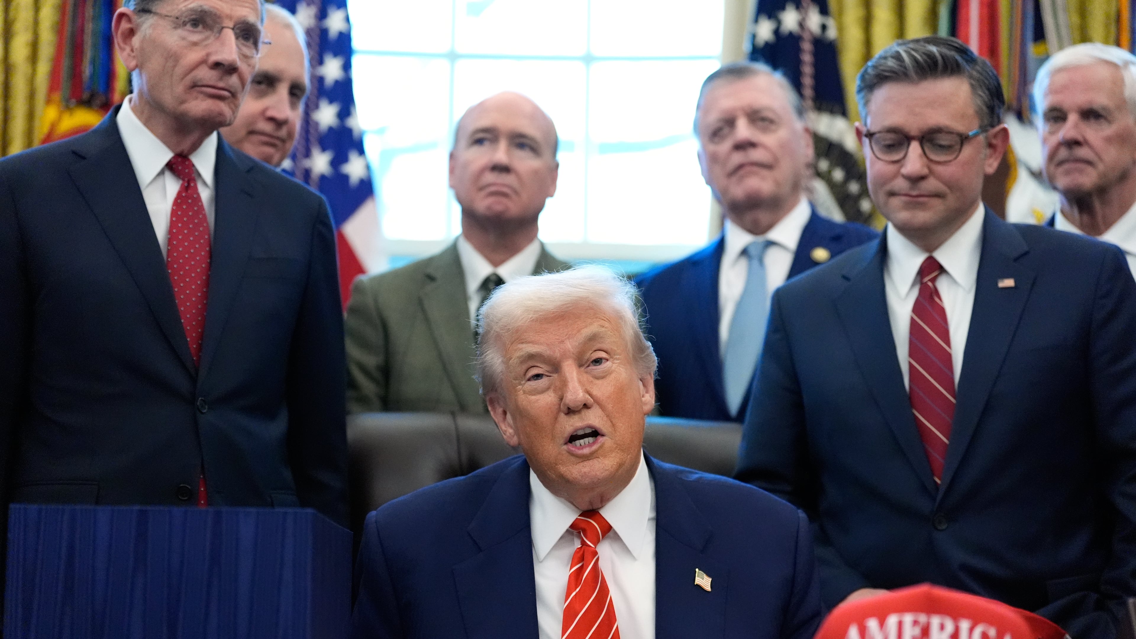 President Donald Trump speaks in the Oval Office of the White House, Tuesday, Feb. 3, 2026, in Washington, before signing a spending bill that will end a partial shutdown of the federal government. (AP Photo/Alex Brandon)
