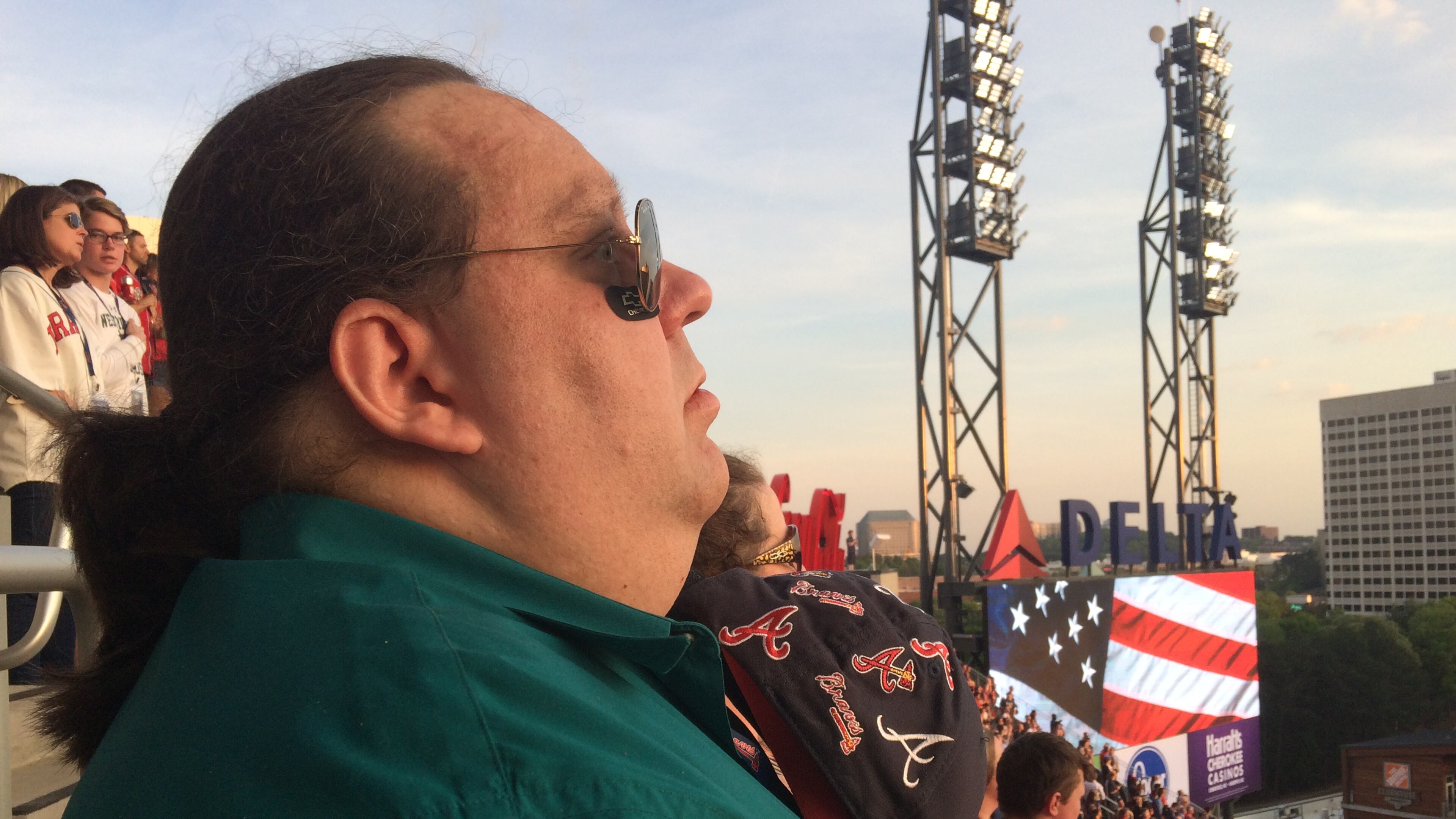 Joey Stuckey stands at attention during the National Anthem at the Braves home opener at SunTrust Park last Friday evening. Photo by Jill Vejnoska/jvejnoska@ajc.com
