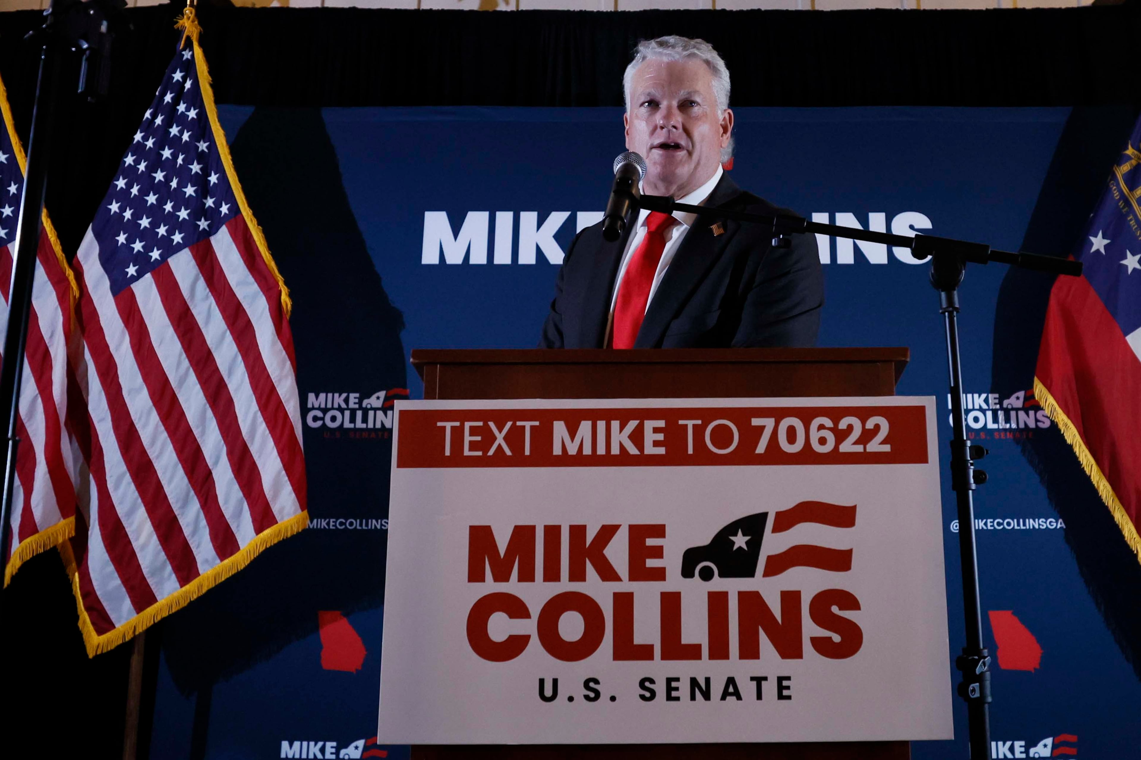 U.S. Rep. Mike Collins speaks to supporters at his watch party after winning the Republican U.S. Senate nomination last month. (Miguel Martinez/AJC)