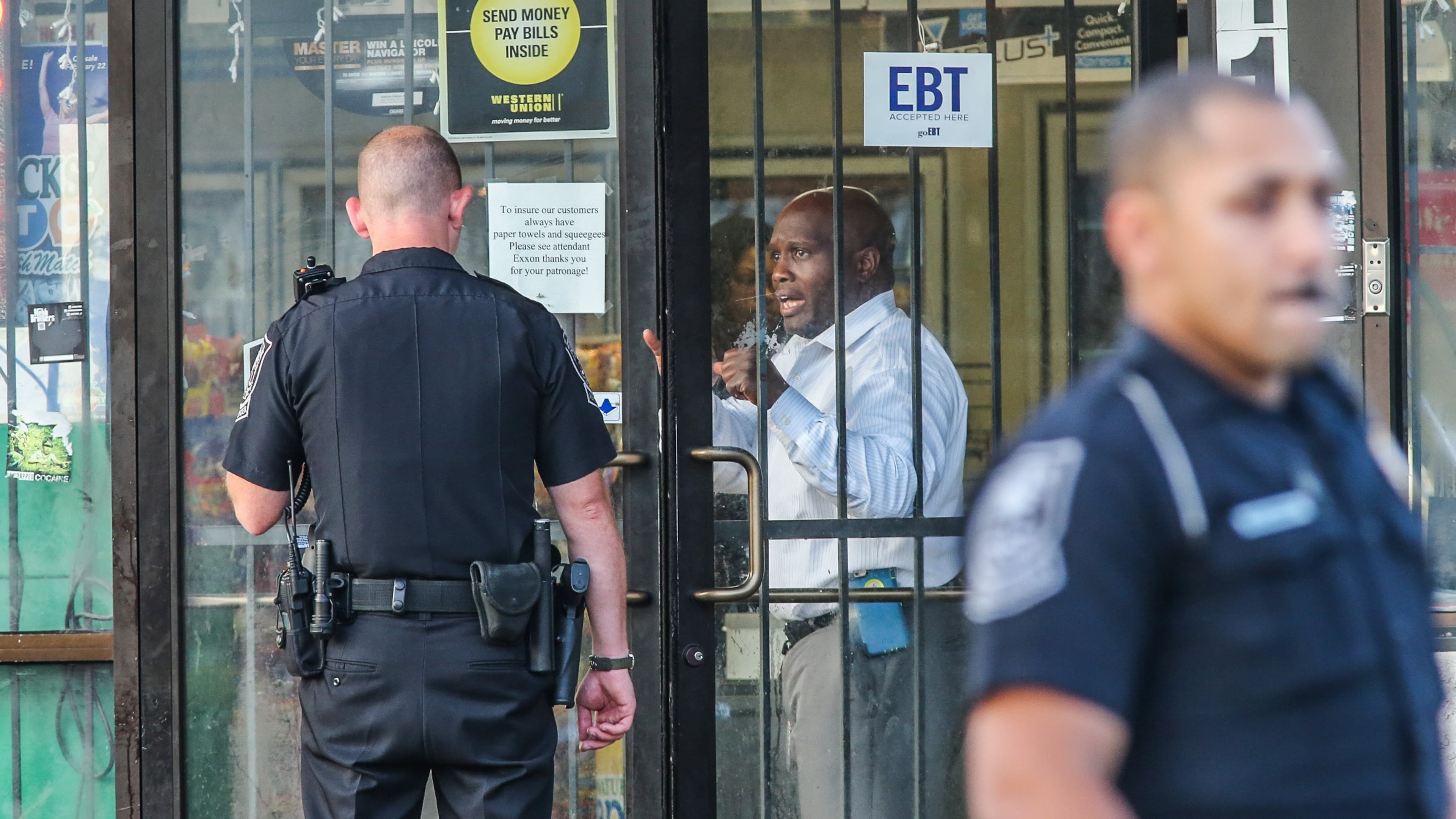 A clerk at the Exxon Food Mart in the 4100 block of Memorial Drive was shot about 4:30 a.m. Mon., July 13, 2015. The clerk later died at Grady Memorial Hospital. JOHN SPINK / JSPINK@AJC.COM