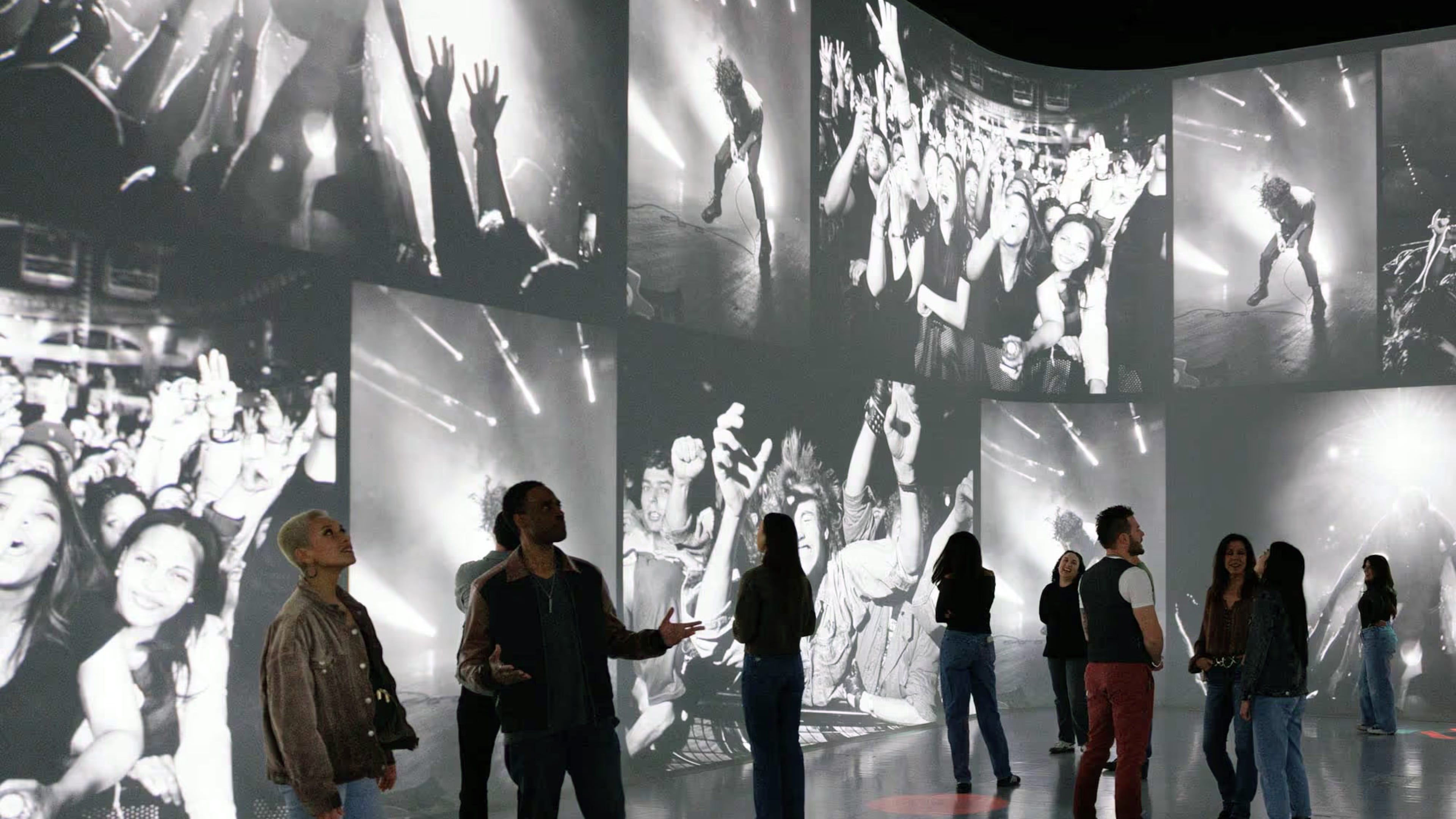 Illuminarium Atlanta has a new immersive experience capturing hundreds of music acts from Elvis to Lizzo in "Amplified: An Immersive Rock Experience," featuring music, video and photos from the entire rock era. (Courtesy of Illuminarium)