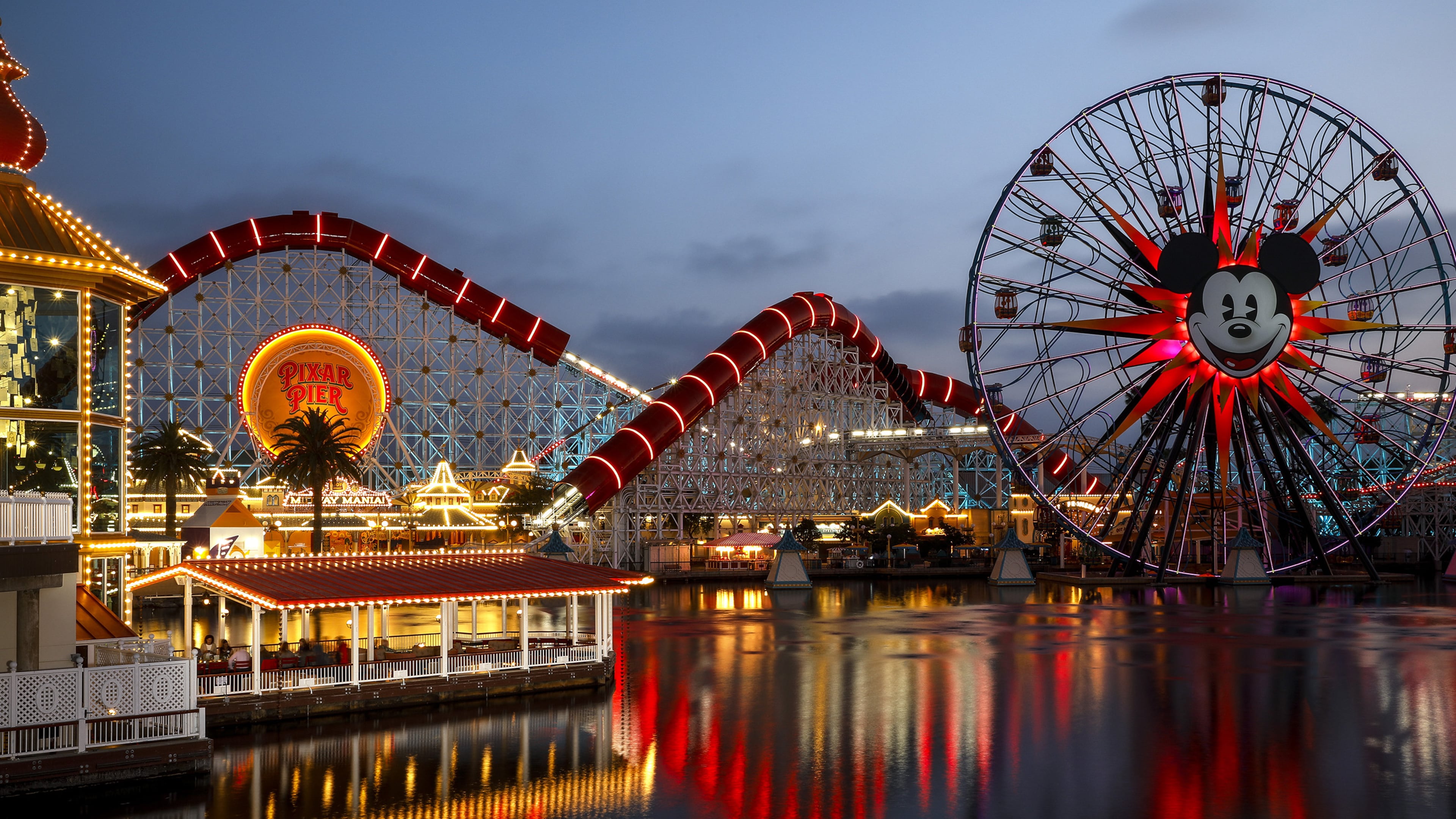 Leaving Pixar Pier at Disney California Adventure Park at the end of a day of press preview in Anaheim, Calif. on June 21, 2018. (Jay L. Clendenin/Los Angeles Times/TNS)