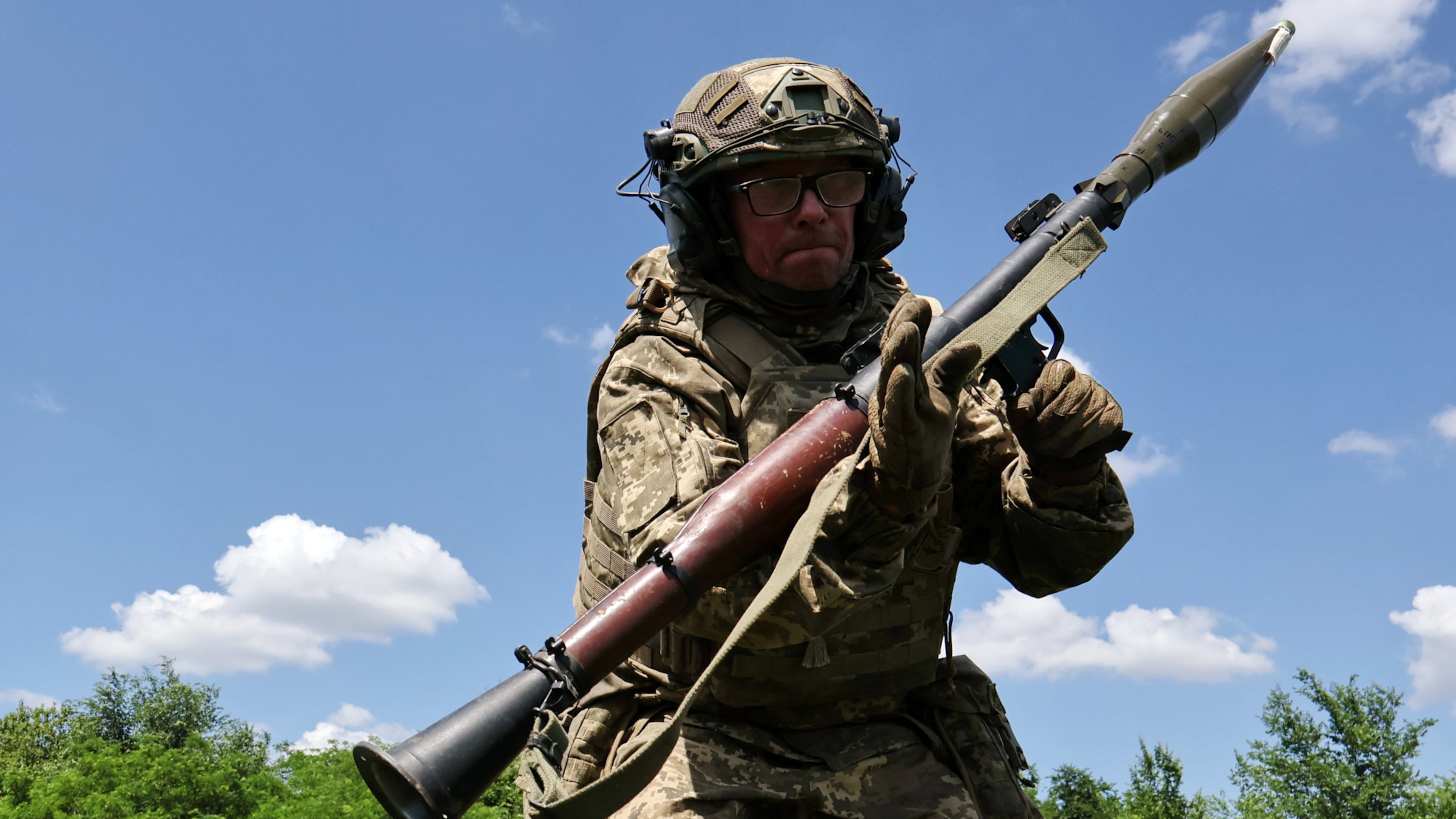 In this photo provided by Ukraine's 65th Mechanized Brigade press service, a soldier practices military skills at a training ground near the frontline in the Zaporizhzhia region, Ukraine, Saturday, June 20, 2026. (Andriy Andriyenko/Ukraine's 65th Mechanized Brigade via AP)
