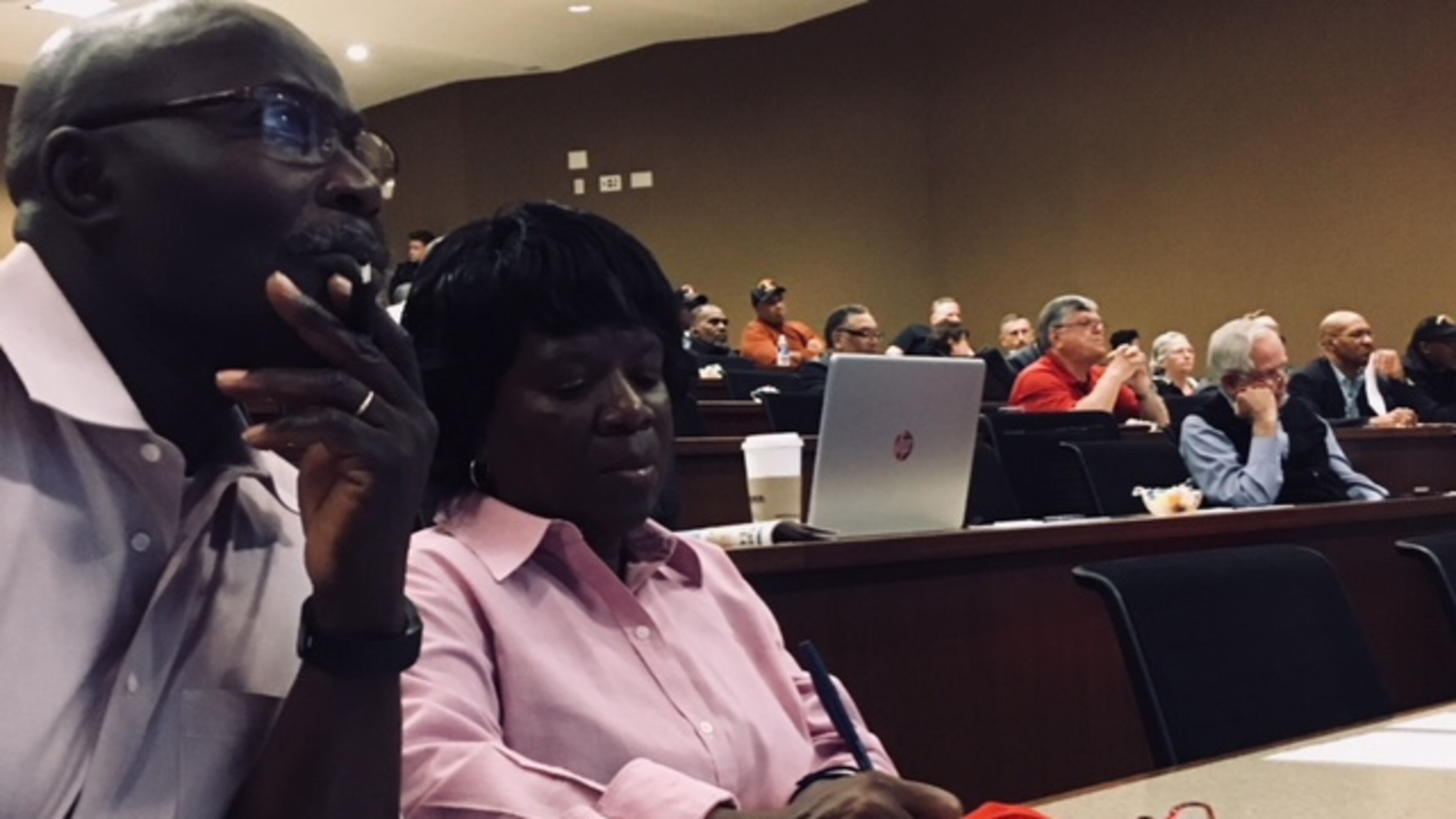 Eddie and Janice Bogan, both Marine veterans who served at Camp Lejeune, listen with other veterans at the Lejeune Community Assistance Panel meeting on Tuesday at Emory University. The Griffin couple were among more than 200 veterans and family members registered for the meeting to hear about contaminated water exposure at the North Carolina base from the 1950s to the 1980s. BRAD SCHRADE / BSCHRADE@AJC