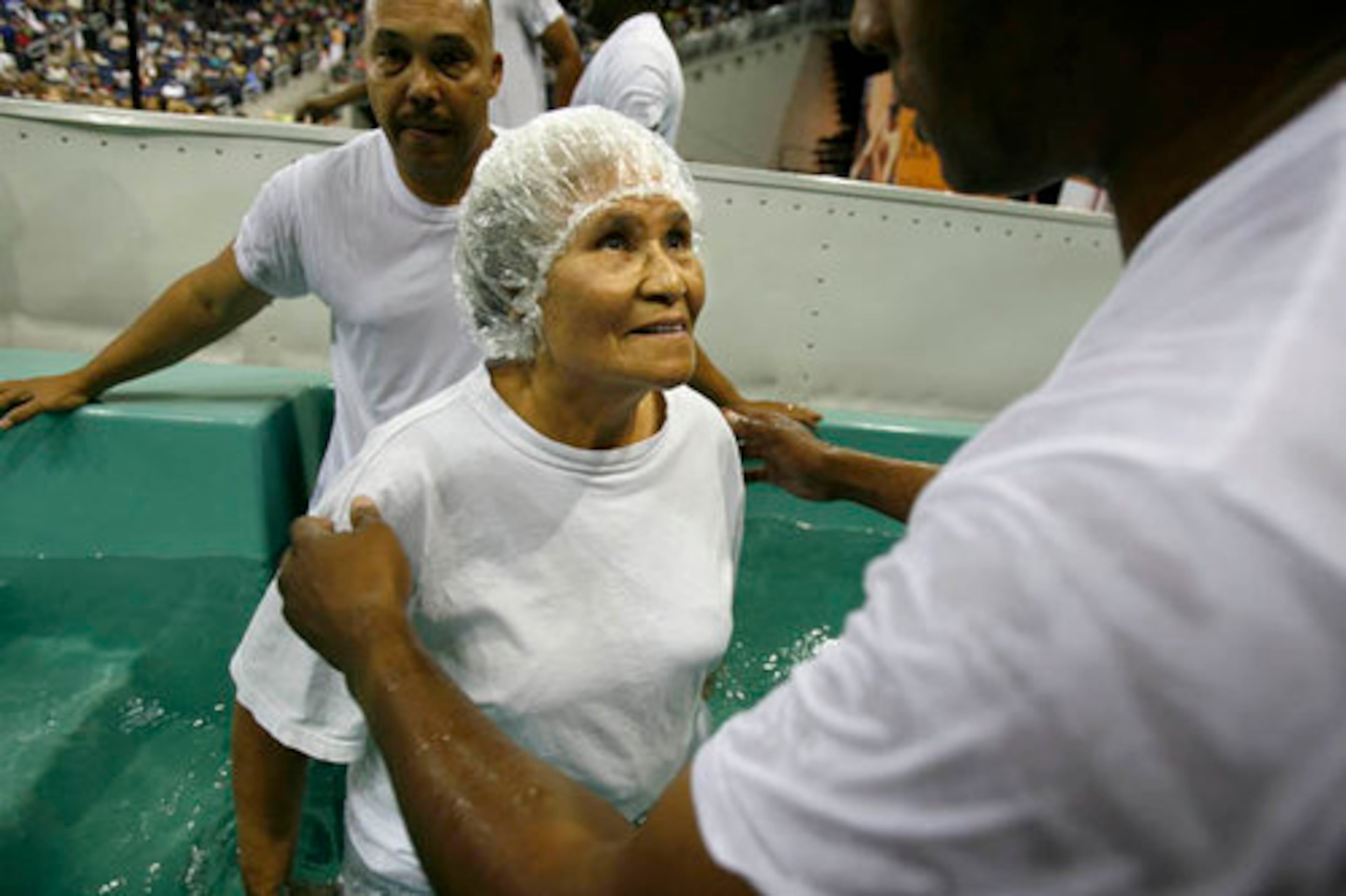 Sarah Harris, 82, gets ready for her immersion baptism.