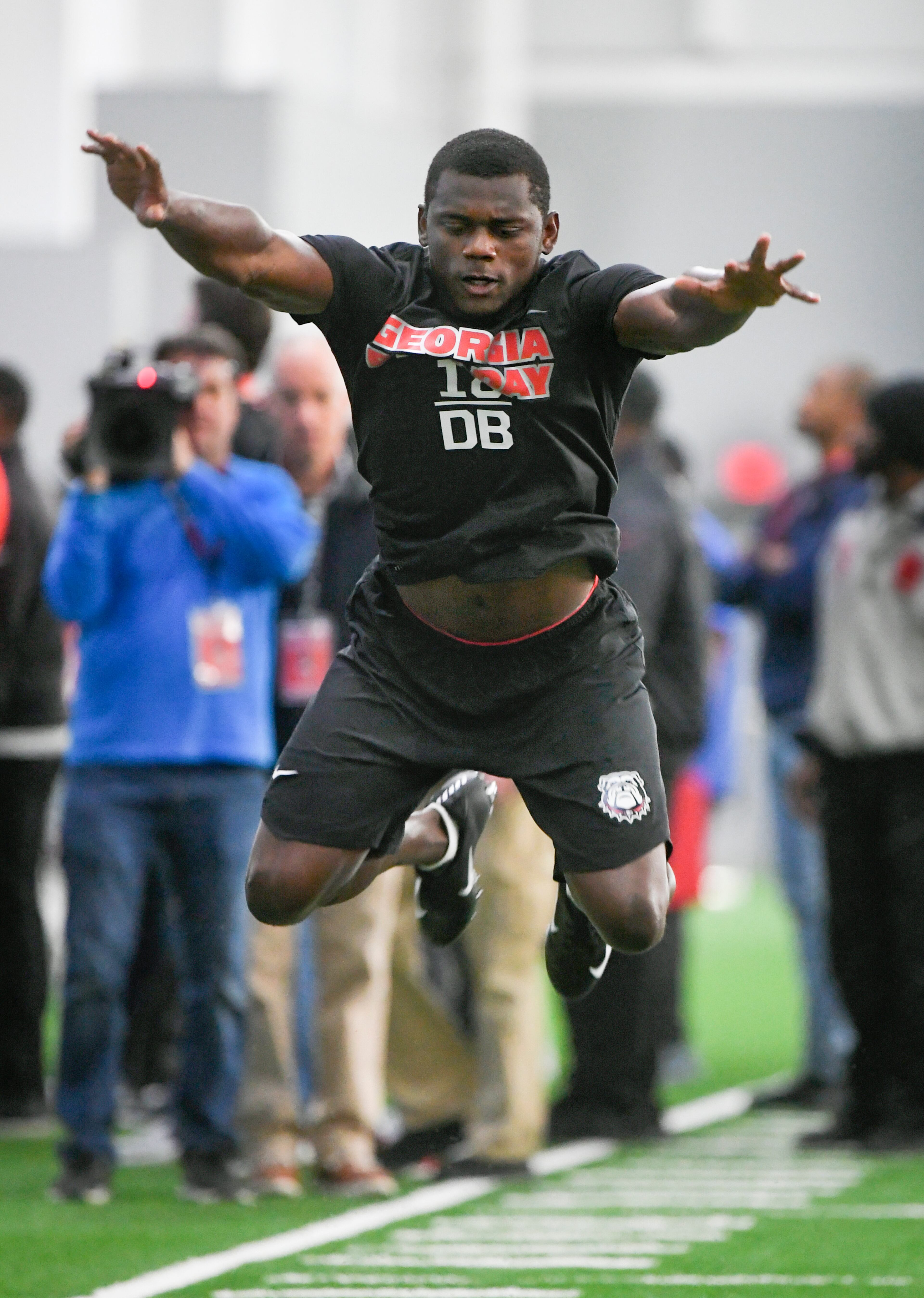 Georgia cornerback Deandre Baker leaps during a football drill during Pro Day at the University of Georgia, Wednesday, March 20, 2019, in Athens, Ga. (AP Photo/John Amis)