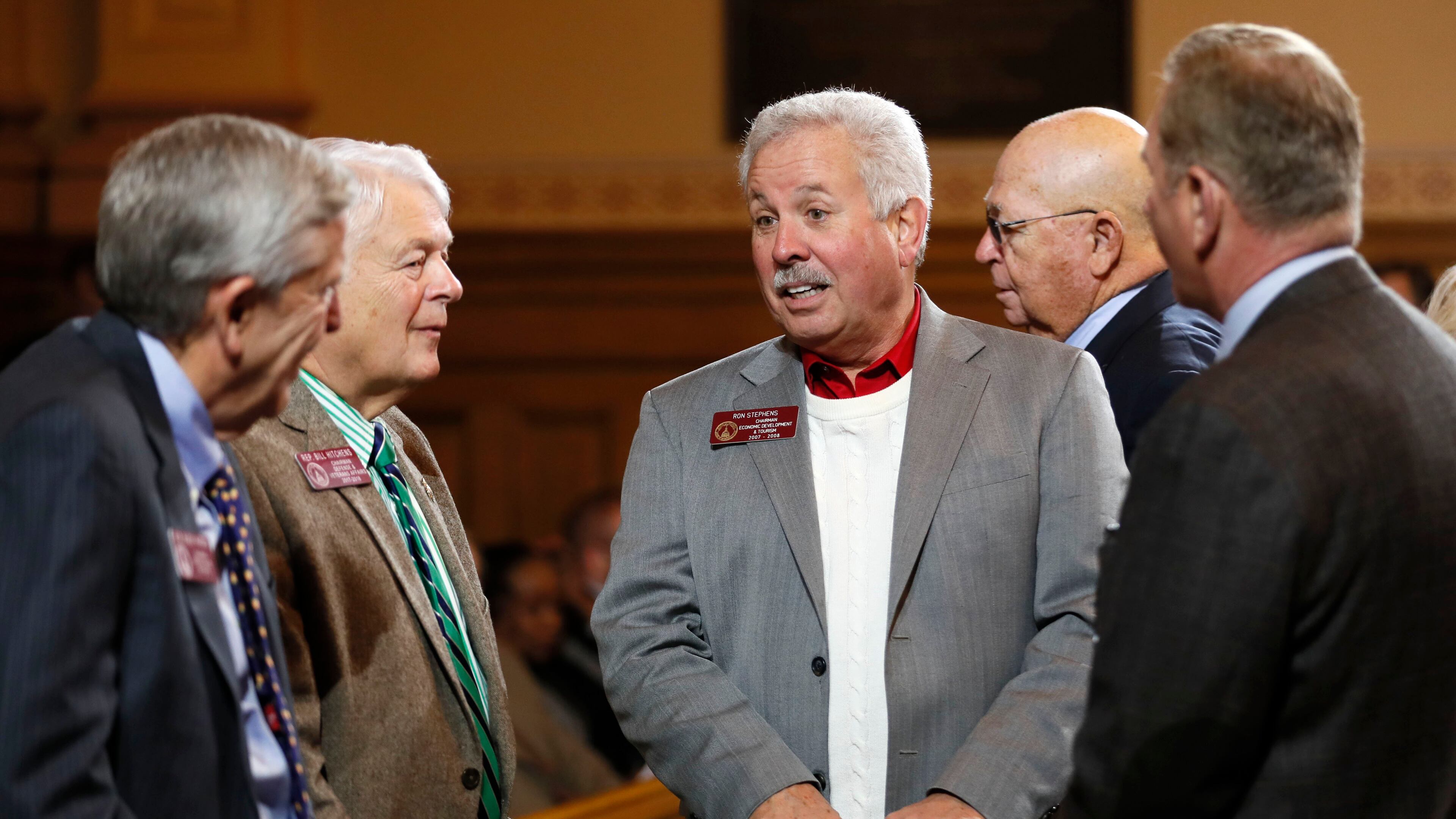 1/15/18 - Atlanta - Rep. Ron Stephens (center), R - Savannah, confers with colleagues before the meeting. Gov. Nathan Deal outlined his budget before the joint appropriation committee this morning at the Capitol. BOB ANDRES /BANDRES@AJC.COM