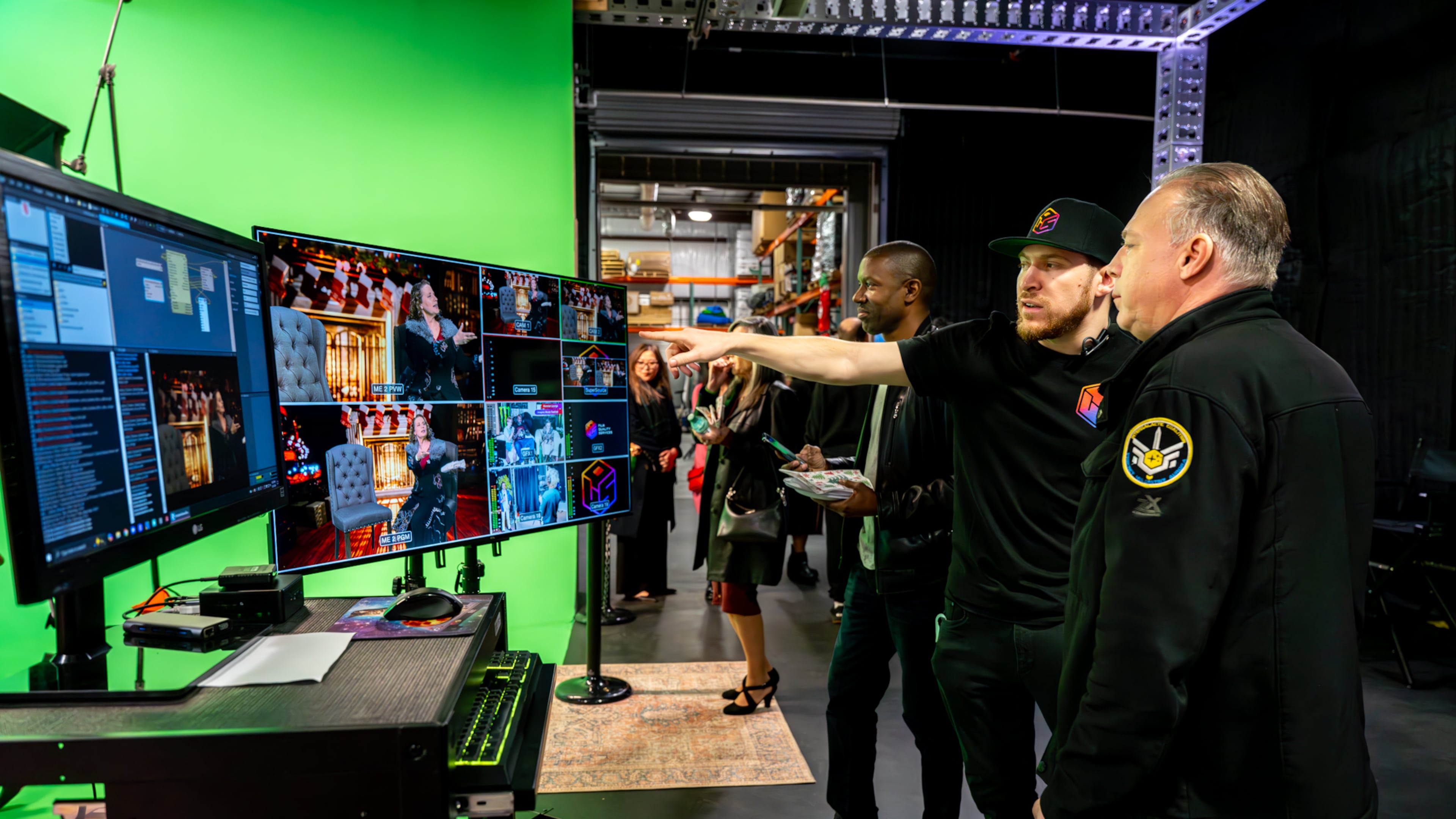 Cody Chesneau (second from right) helped transform warehouses once part of his family's fuel business into studio space in Flowery Branch. (Courtesy of DV Photo Video)