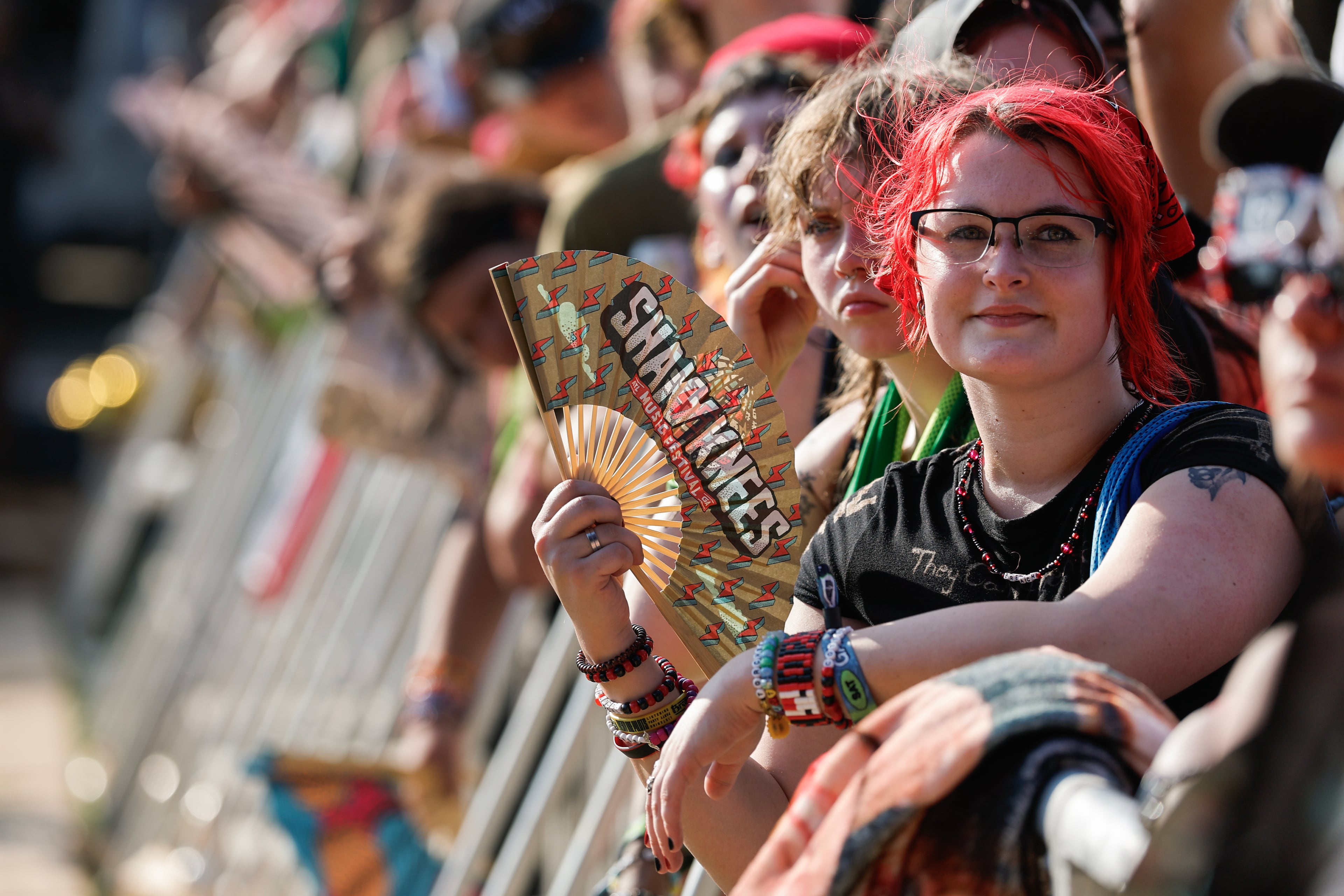 Fans listen to Peach Pit perform during the Shaky Knees music festival at Piedmont Park, Saturday, Sept. 19, 2026, in Atlanta. (Erik S. Lesser for the AJC)