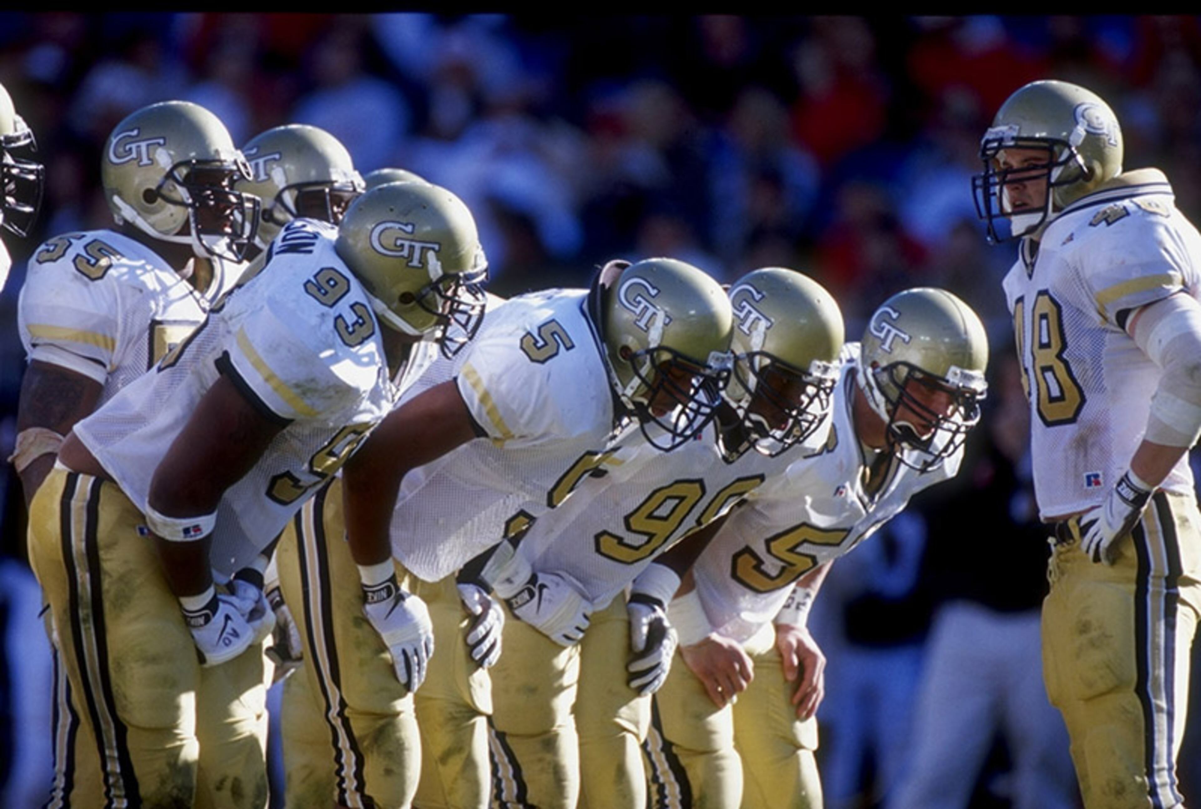 Georgia Tech debuted white jerseys with gold numerals in a 1997 bowl game and wore various versions through 2002. Here is a version during a 1998 game.