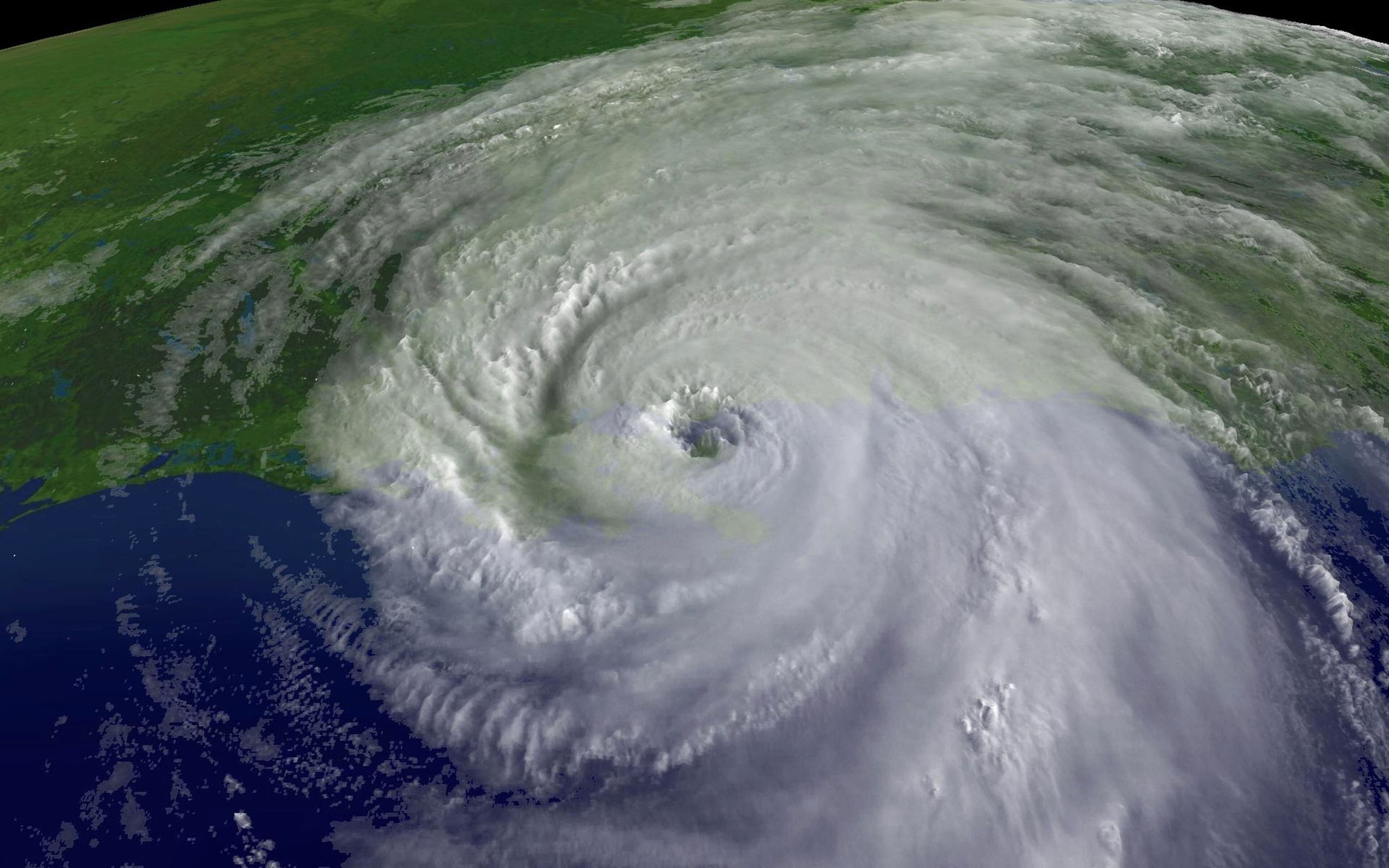 In this satellite image from NOAA, a close up of the center of Hurricane Katrina's rotation is seen at 9:45am EST on August 29, 2005 over southeastern Louisiana. Katrina made landfall this morning as a Category 4 strom with sustained winds in excess of 135 mph near Empire, Louisiana. (Photo by NOAA via Getty Images)