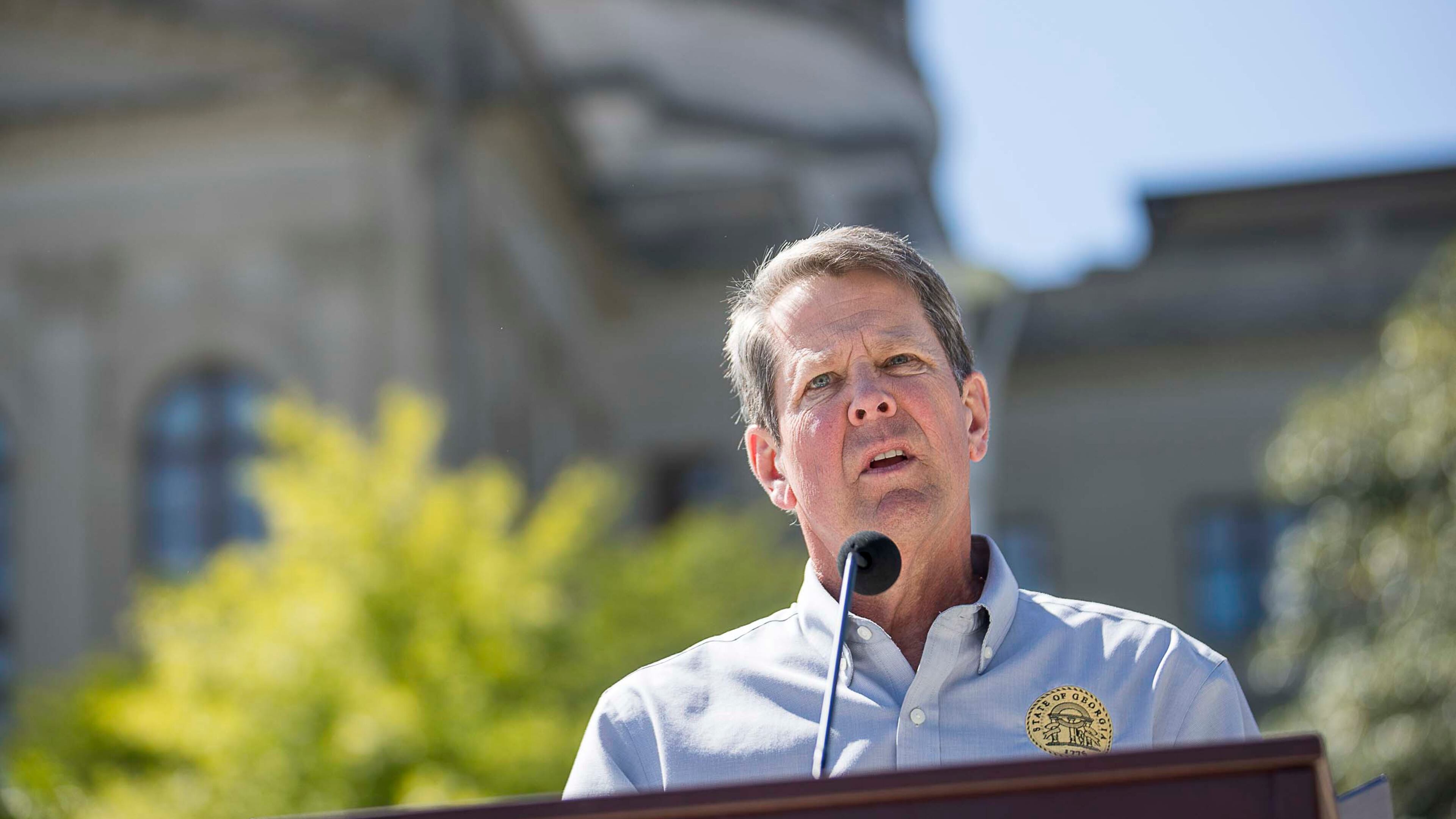 04/20/2020 - Atlanta, Georgia - Georgia Gov. Brian Kemp makes remarks during a press conference at Liberty Plaza, across the street from the Georgia State Capitol building in Atlanta, Monday, April 20, 2020. During the presser, Gov. Kemp revealed that he planned to allow some small business owners to open back up by the end of the week. Other business would open up the following Monday. However, Georgia private and public K-12 schools, colleges and universities would remain closed for the remainder of the 2019-2020 school year. (ALYSSA POINTER / ALYSSA.POINTER@AJC.COM)