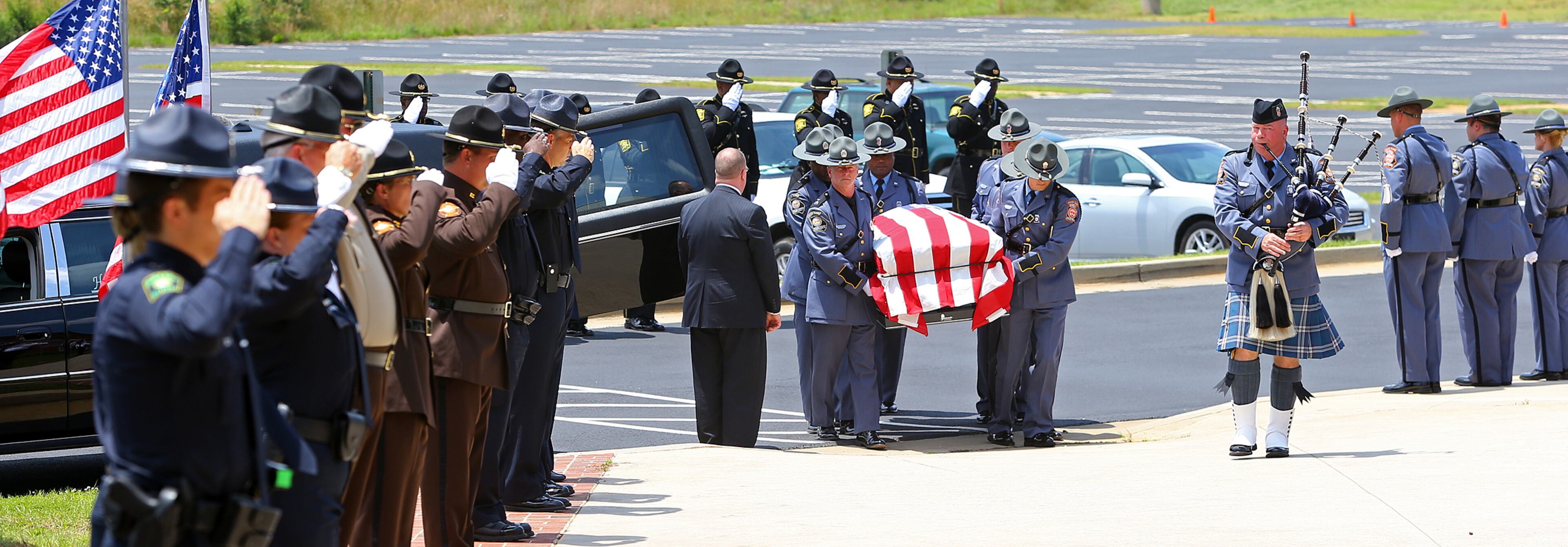 The funeral for Griffin police officer Kevin "Shogun" Dorian Jordan, 43, was held Monday at the Oak Hill Baptist Church in Williamson. Jordan, a four-year veteran of the Griffin police force and father of seven, was shot and killed May 31 while working off-duty at a Waffle House on U.S. 41. Jordan was attempting to remove three drunken and disruptive customers from the restaurant when the shooting occurred. Police said Chantell Mixon, 28, put up a fight in the parking lot while Jordan tried to arrest her. Police said Mixon's boyfriend, 30-year-old Michael Dwayne Bowman, pulled out a gun and shot Jordan at least three times. CURTIS COMPTON / CCOMPTON@AJC.COM