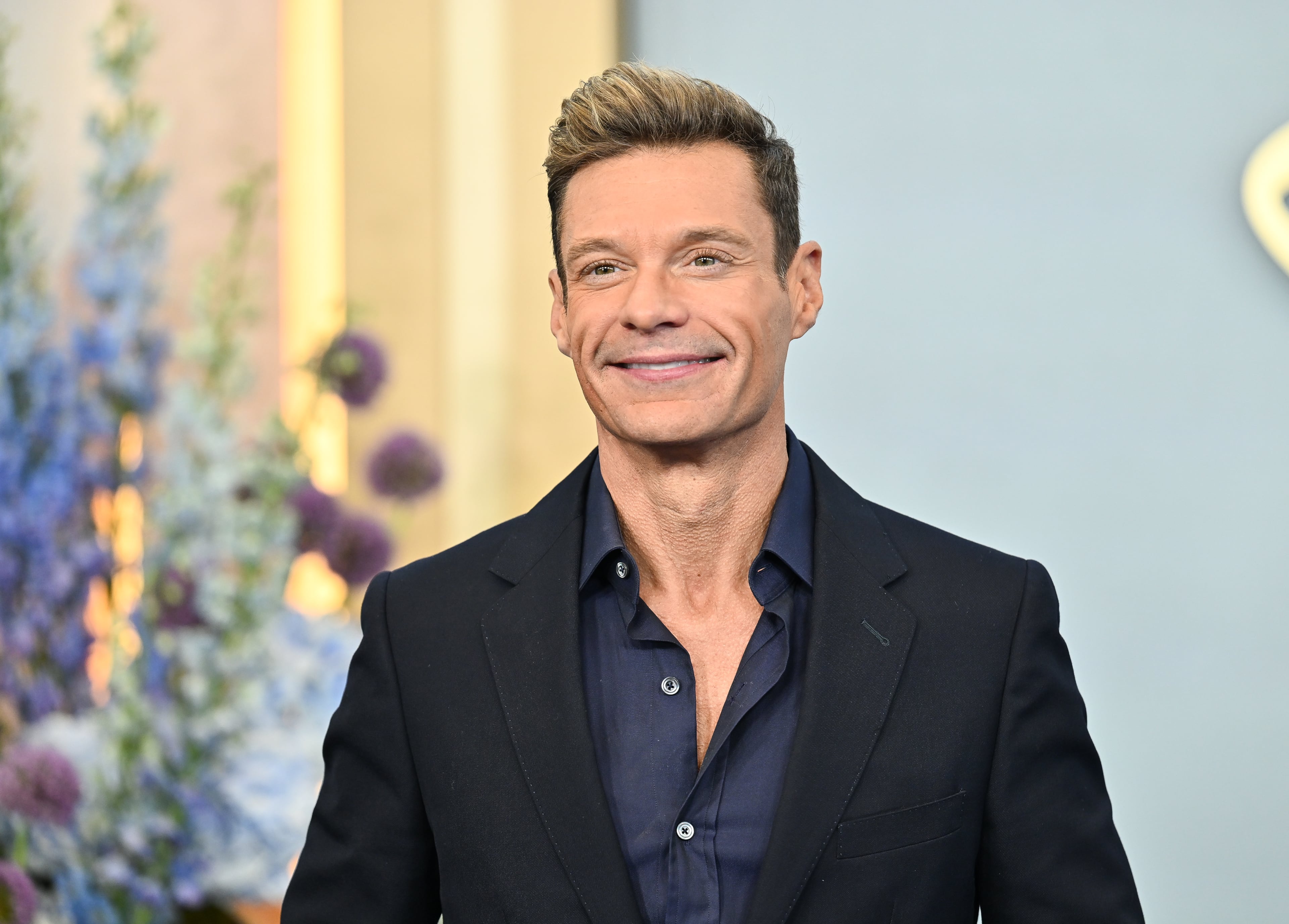 Dunwoody's Ryan Seacrest, pictured in May, will be in metro Atlanta to film "American Idol." (Evan Agostini/AP)