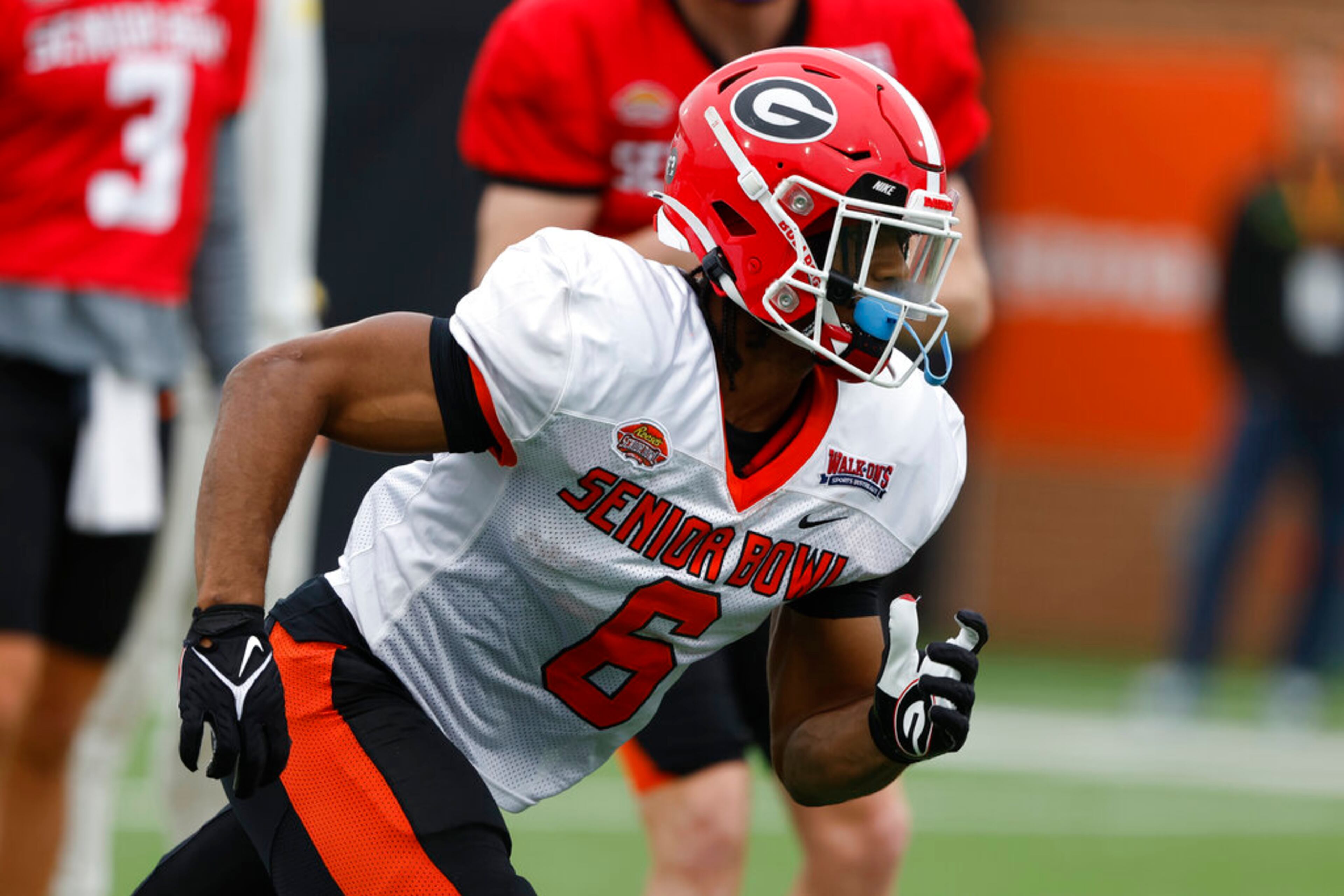 American running back Kenny McIntosh of Georgia (6) runs through drills during practice for the Senior Bowl NCAA college football game Thursday, Feb. 2, 2023, in Mobile, Ala.. (AP Photo/Butch Dill)