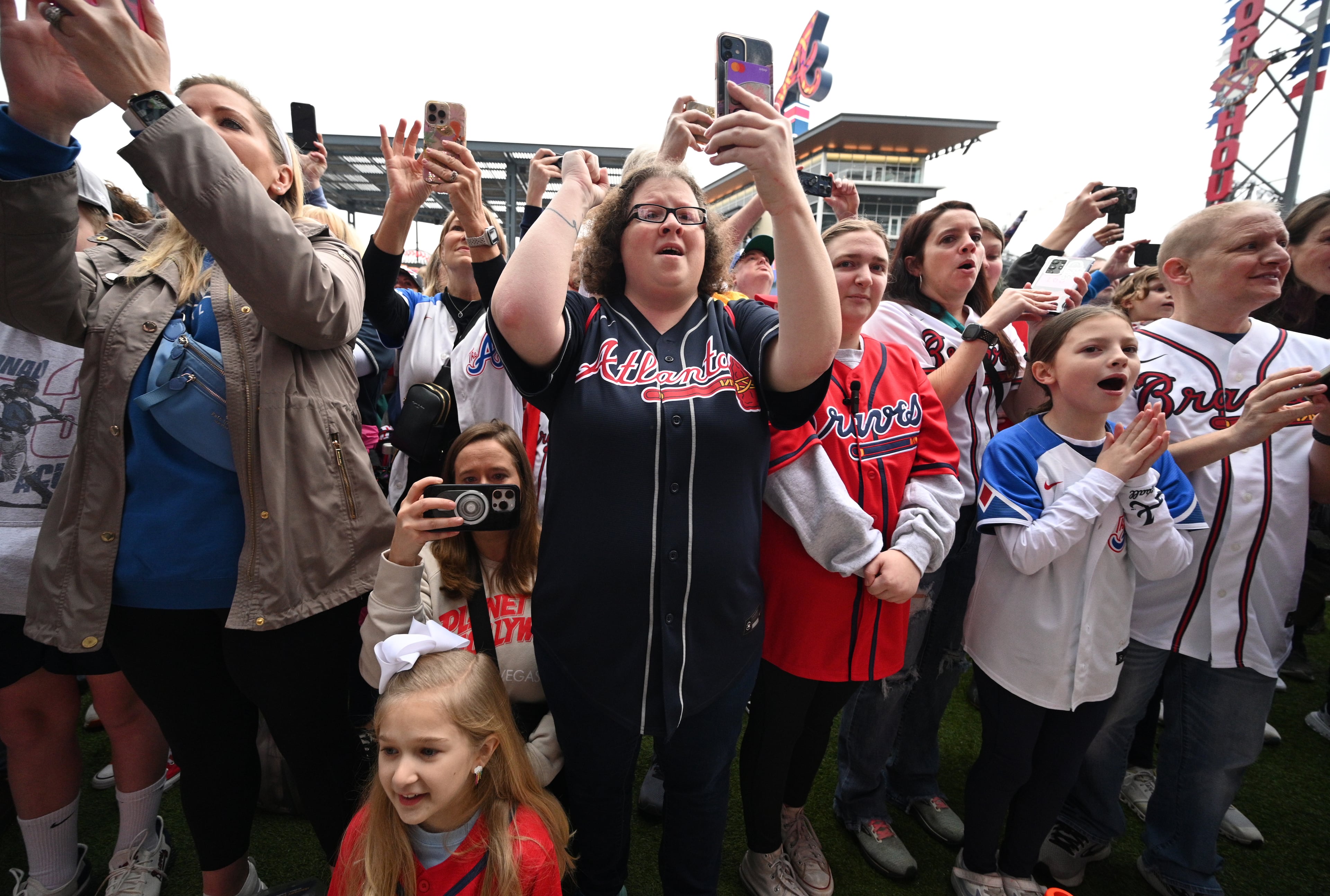 Fans cheer at the Georgia Power Pavilion Stage. (Hyosub Shin / Hyosub.Shin@ajc.com)