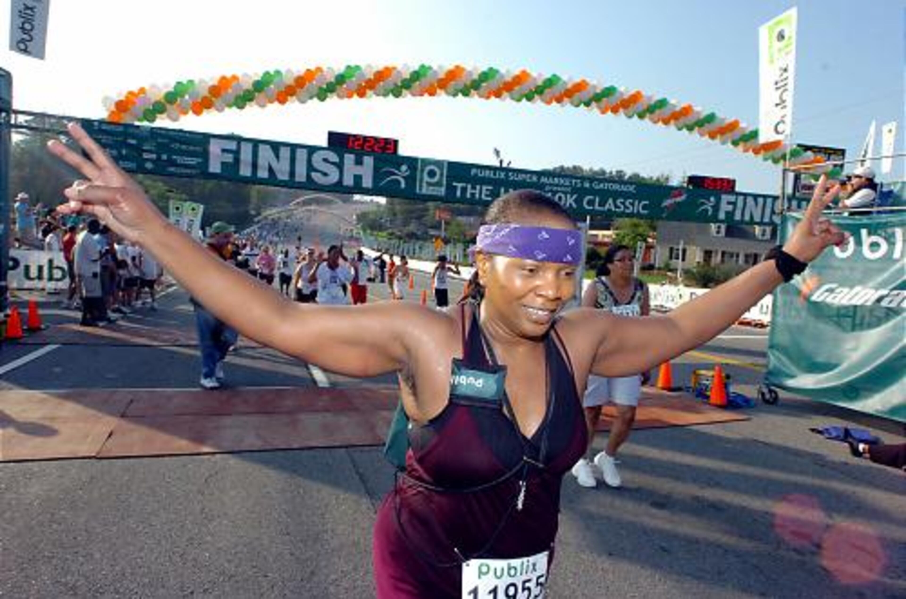 Ava Jordan of Atlanta celebrates after crossing the finish line.