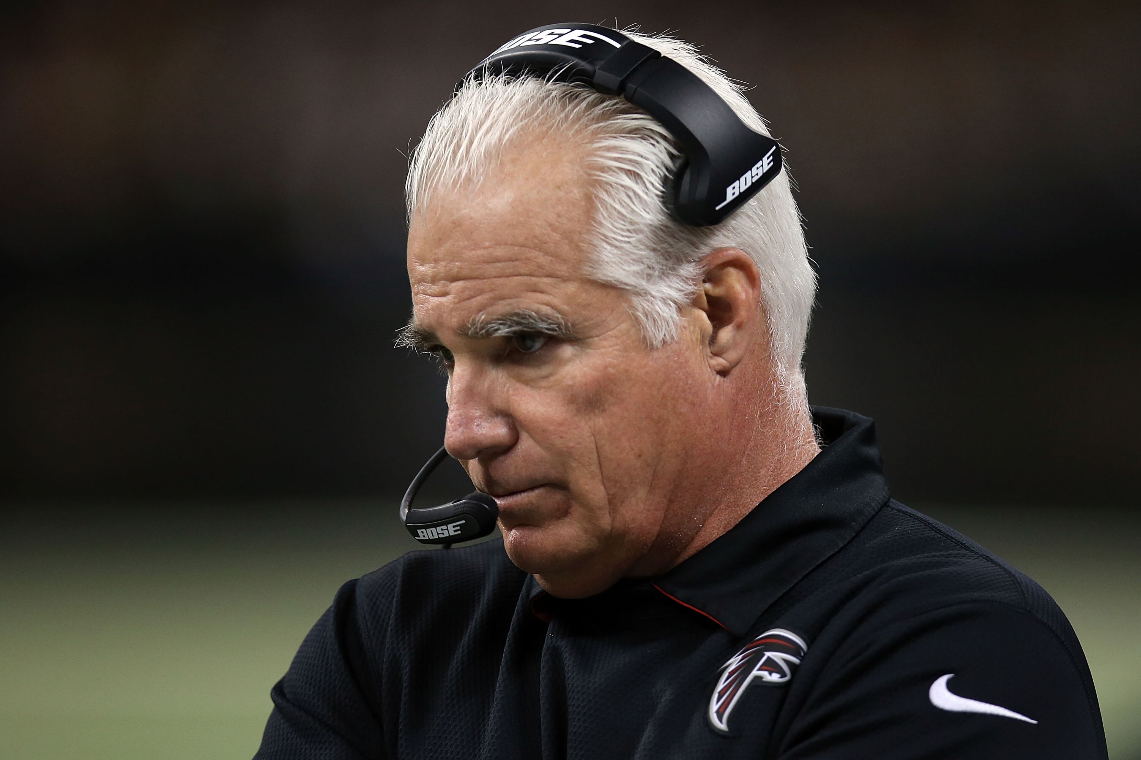 NEW ORLEANS, LA - DECEMBER 21: Head coach Mike Smith of the Atlanta Falcons watches action during the second quarter of game against the New Orleans Saints at the Mercedes-Benz Superdome on December 21, 2014 in New Orleans, Louisiana. (Photo by Chris Graythen/Getty Images)