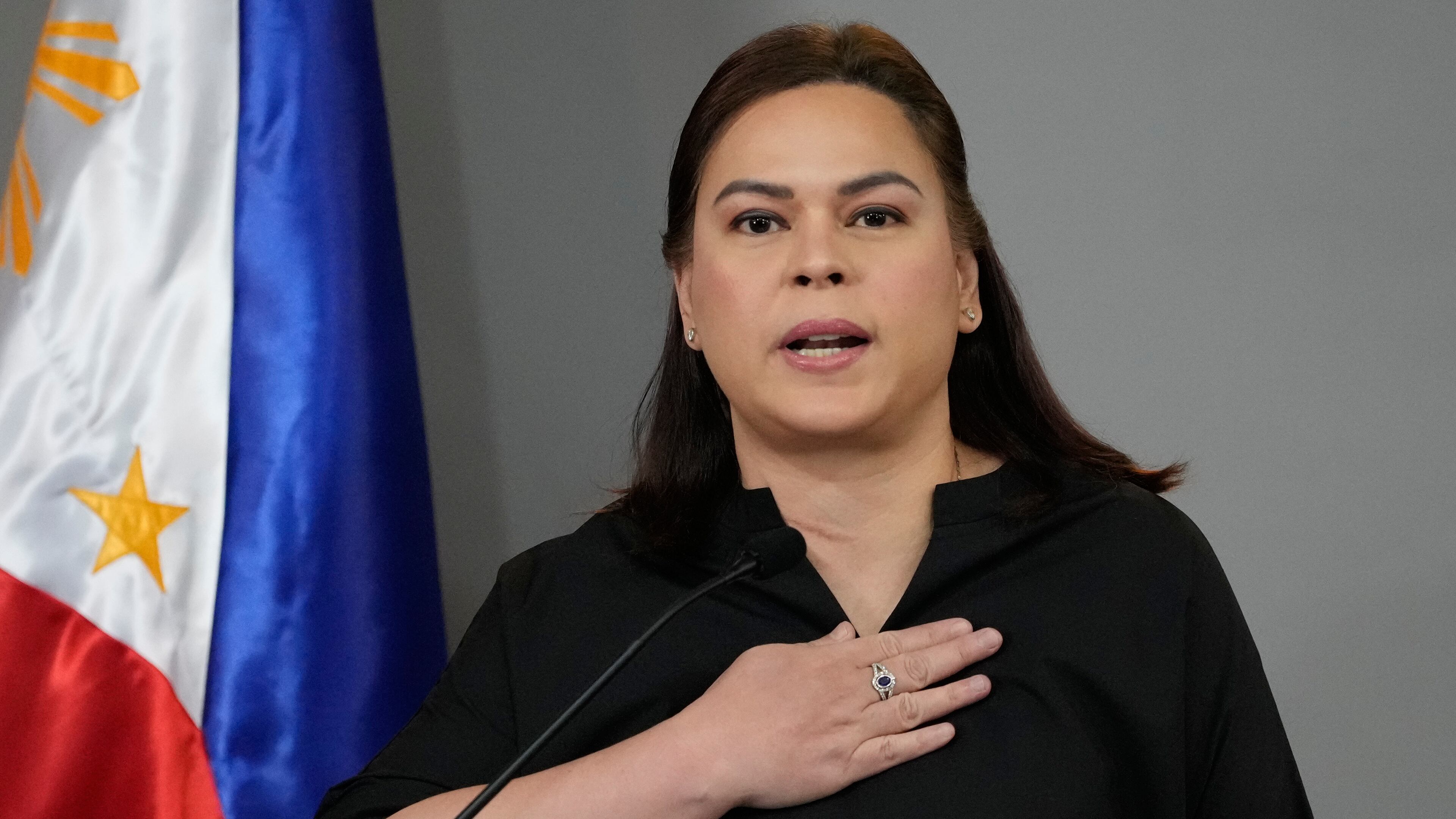 Philippine Vice President Sara Duterte gestures as she announces her intention to run for president in the next elections during a press conference on Wednesday, Feb. 18, 2026, in Manila, Philippines. (AP Photo/Aaron Favila)