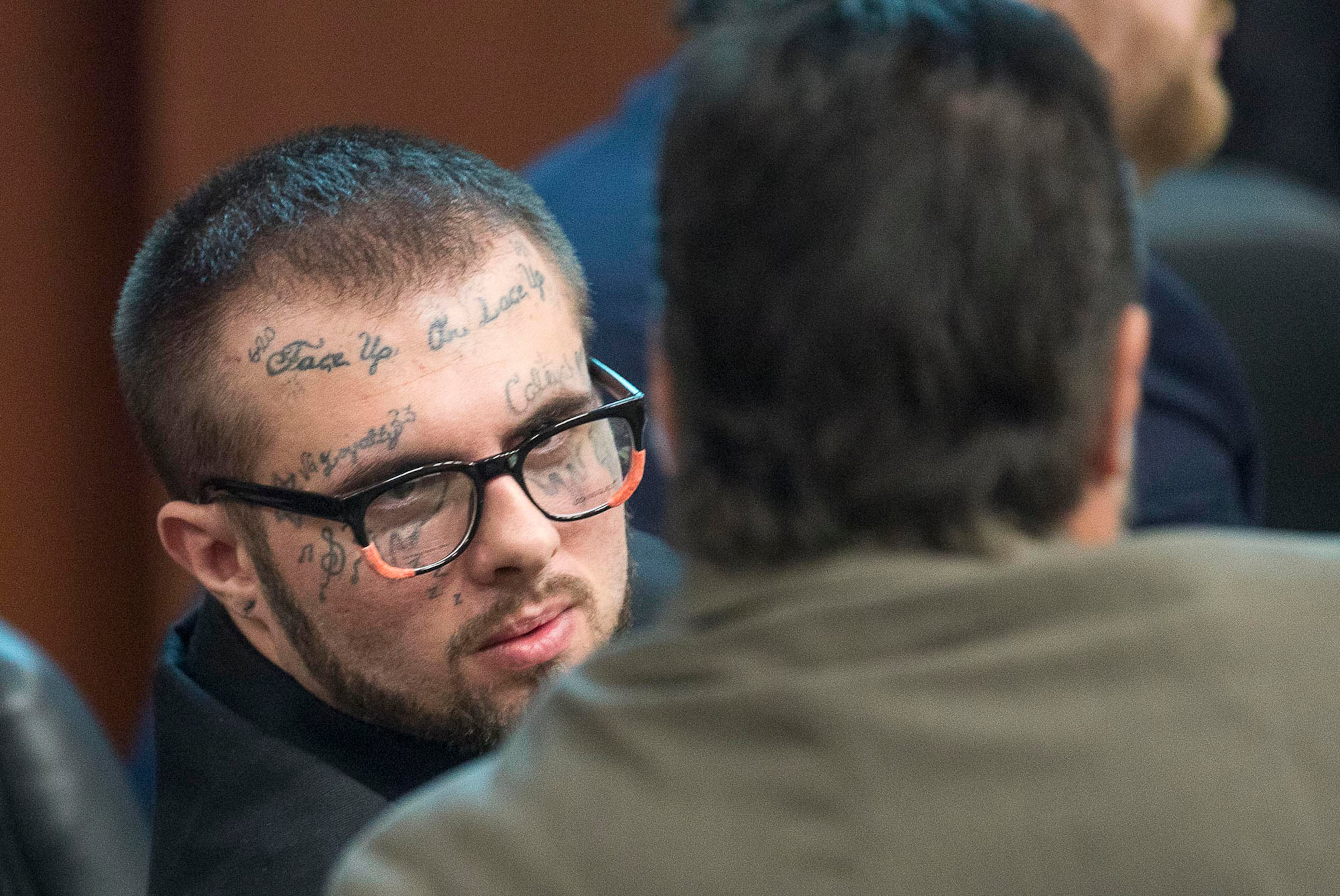05/13/2019 -- Covington, Georgia -- Christopher McNabb (left) speaks with his lawyer Anthony Carter (right) during his and Cortney Bell's murder trial in front of Georgia Chief Superior Court Judge John M. Ott at the Newton County Courthouse in Covington, Monday, May 13, 2019. (ALYSSA POINTER/ALYSSA.POINTER@AJC.COM)