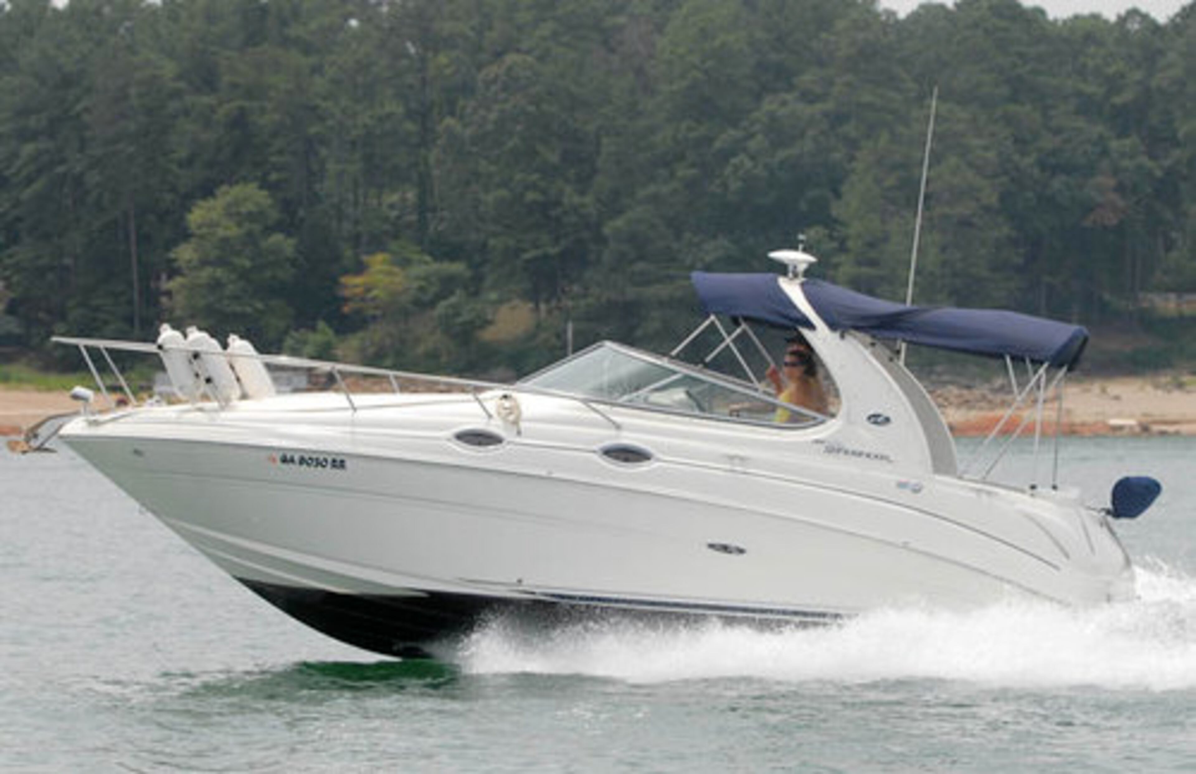 A boat cruises down the lake. The event at Lake Lanier is expected to bring out 900 boaters on 200 boats.