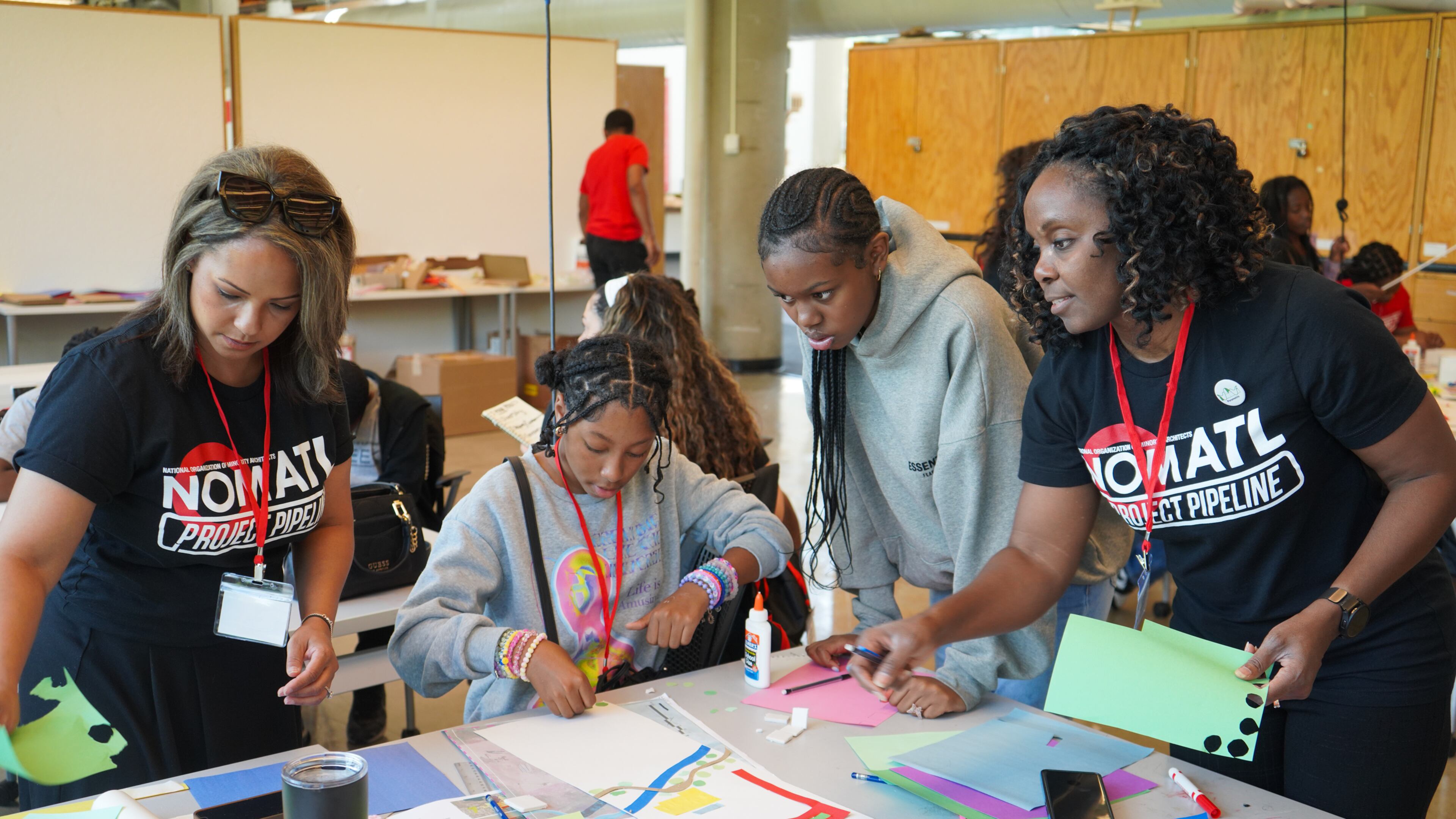 NOMA Atlanta member Crysta Hailes (left) and chapter President Shelly-Anne Tulia Scott work with students during the 2024 summer camp at Georgia Tech. Courtesy