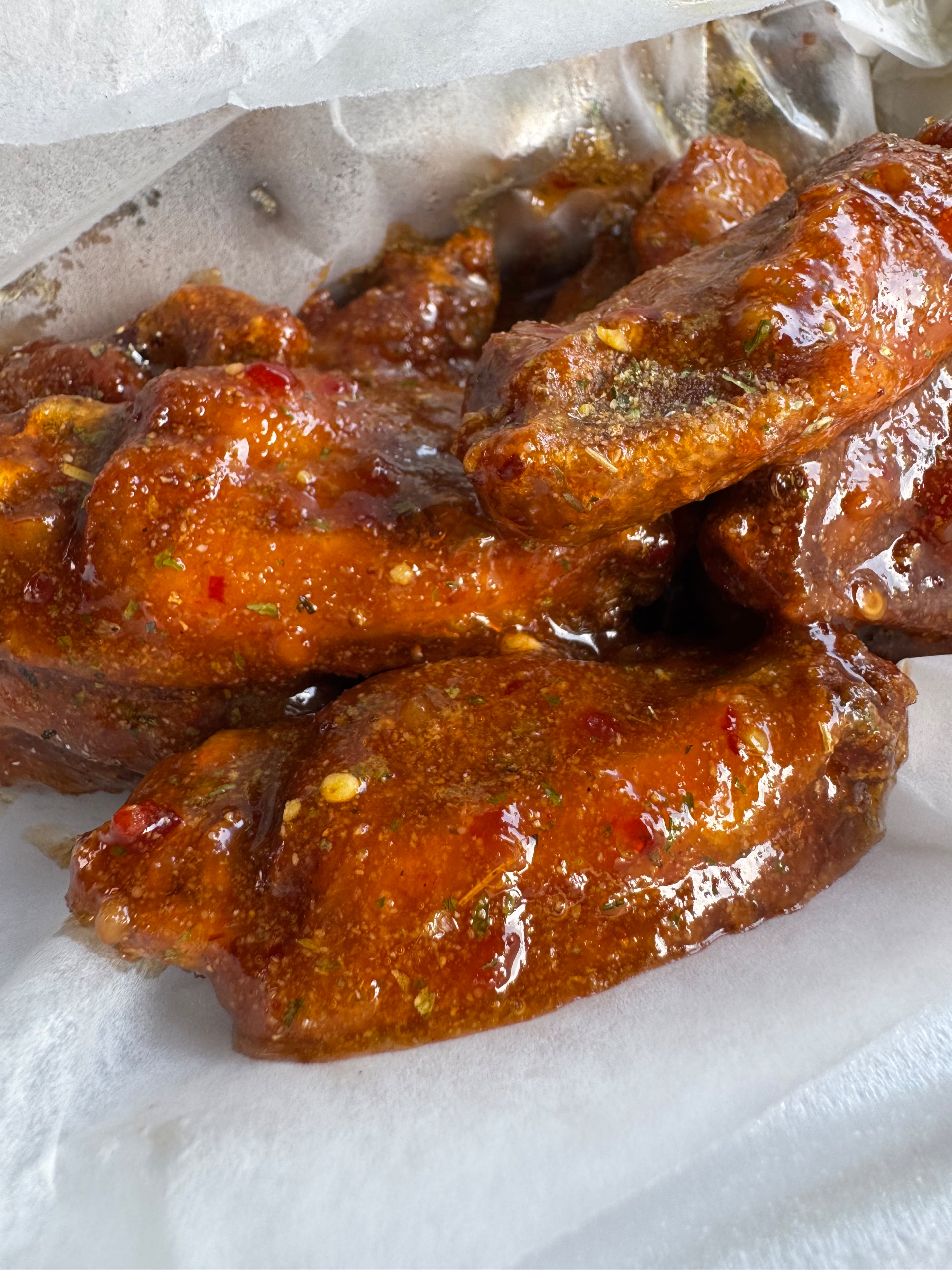 Braised wings, a uniquely tender option from Wings on Wheat. (Justin Brown for the AJC)
