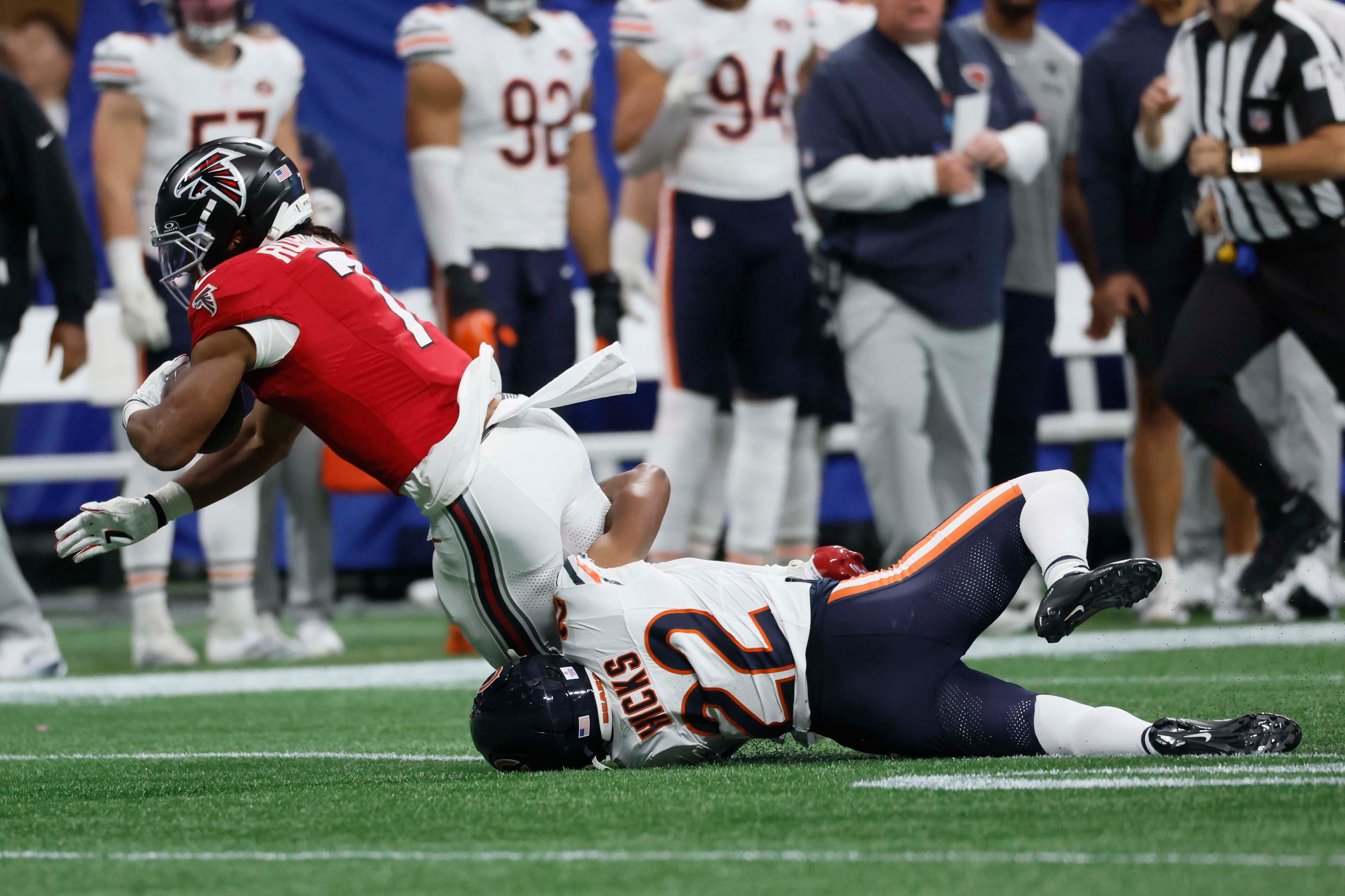 Chicago Bears safety Elijah Hicks stops Atlanta Falcons tackle Bijan Robinson from running during the second half of an NFL game between the Chicago Bears and the Atlanta Falcons at Mercedes-Benz Stadium in Atlanta on Sunday, Oct. 18, 2026. (Miguel Martinez/AJC)