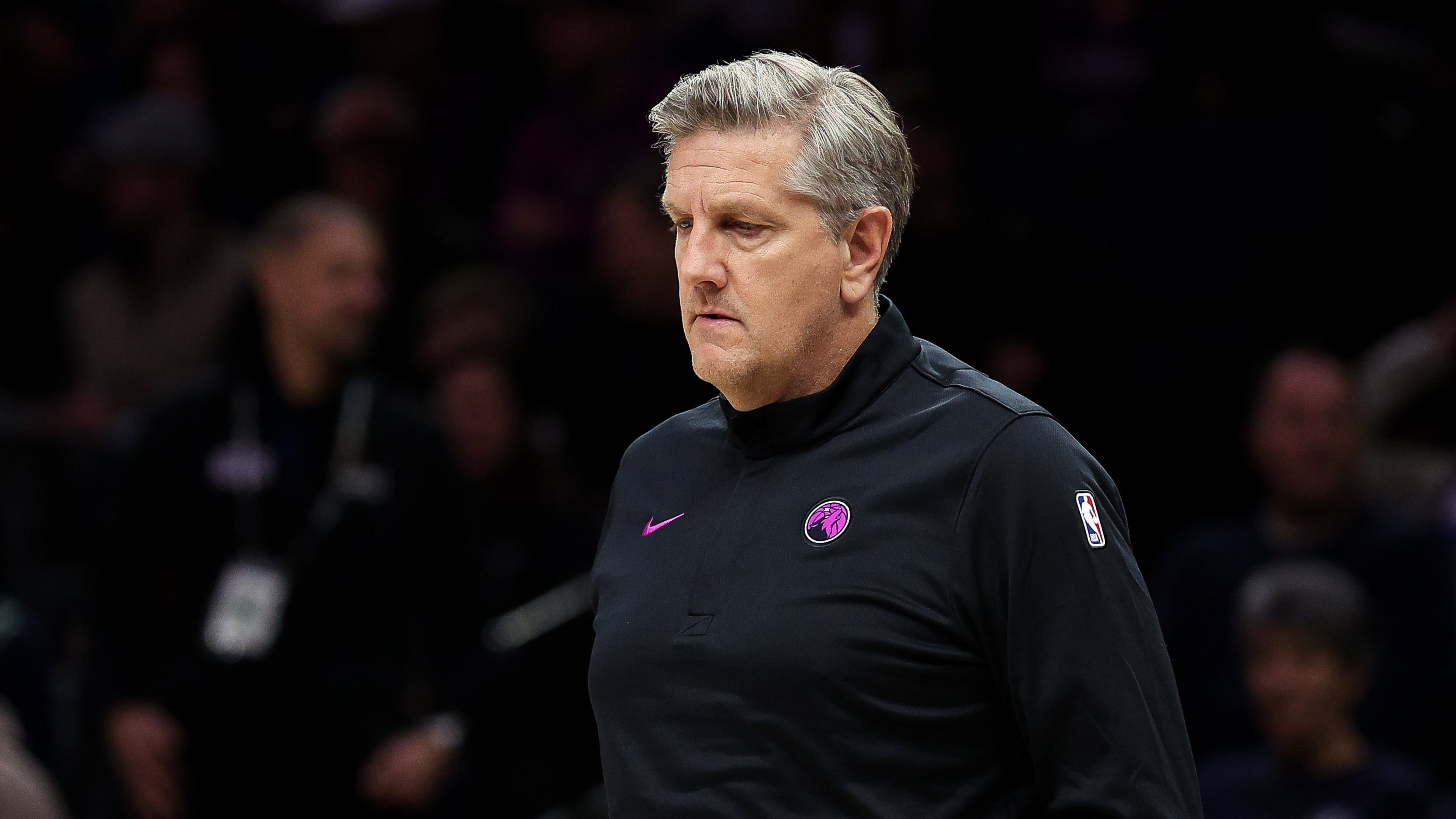 Minnesota Timberwolves head coach Chris Finch looks on during the first half of an NBA basketball game against the Golden State Warriors, Sunday, Jan. 25, 2026, in Minneapolis. (AP Photo/Matt Krohn)