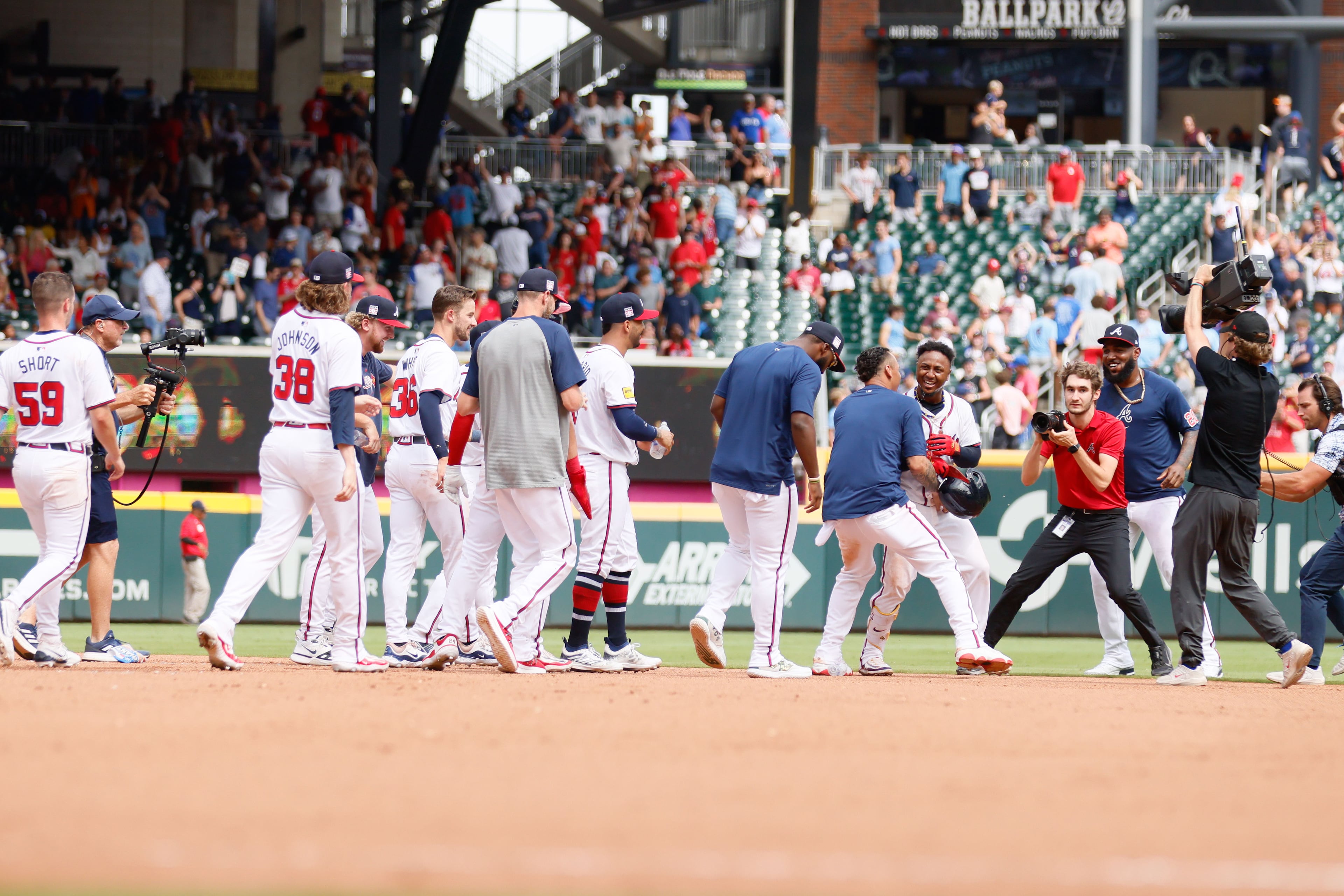 Atlanta Braves second base Ozzie Albies (1) is congratulated after hitting a walk-off sacrifice fly to beat the St. Louis Cardinals 3-2 at Truist Park on Saturday, July 20, 2024, in Atlanta.
(Miguel Martinez/ AJC)