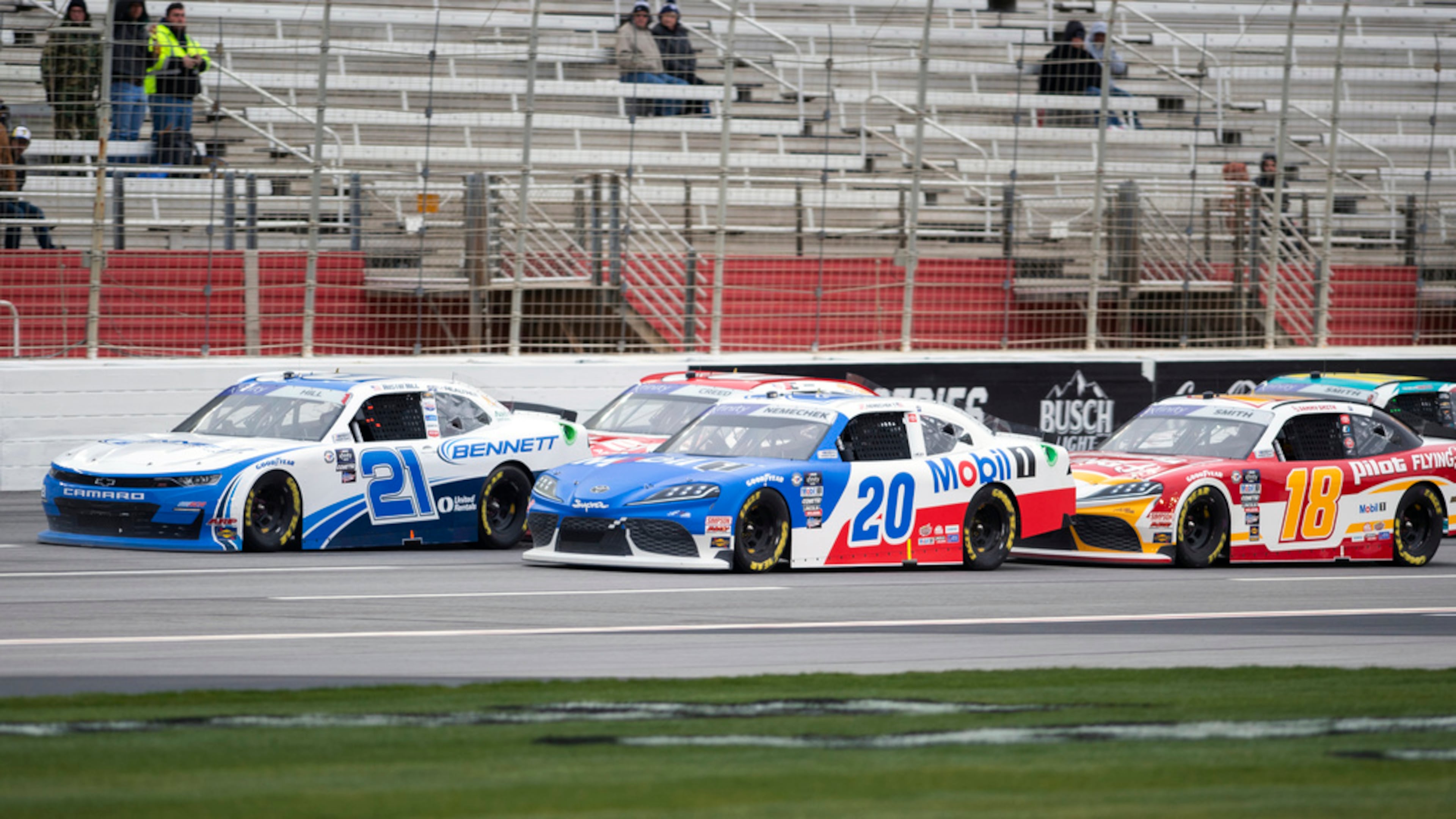 Austin Hill (21) leads at the start of the NASCAR Xfinity Series auto race at Atlanta Motor Speedway on Saturday, March 18, 2023, in Hampton, Ga. (AP Photo/Hakim Wright Sr.)
