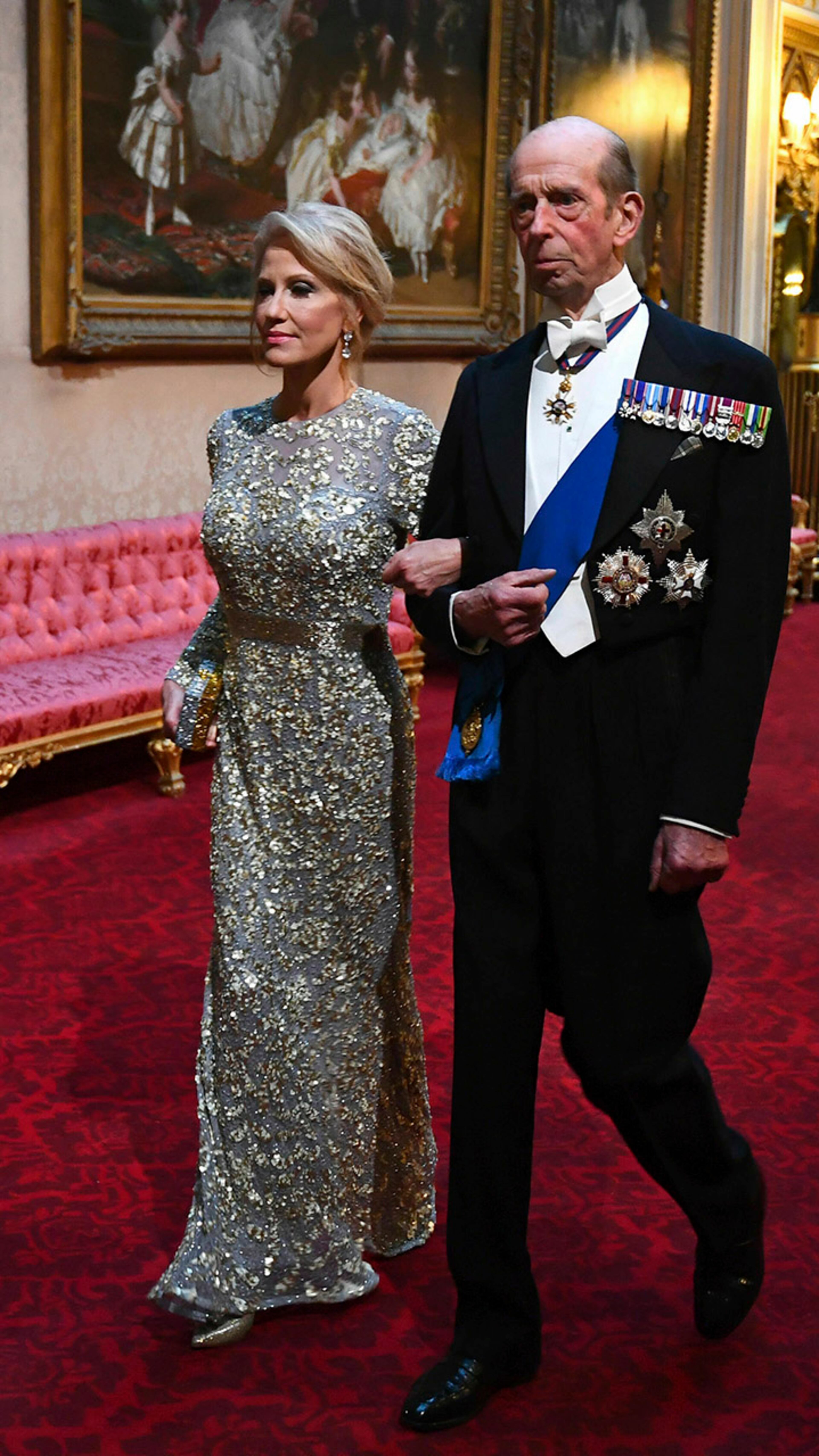 White House counselor Kellyanne Conway and the Duke of Kent arrive through the East Gallery during the state banquet at Buckingham Palace on Monday, June 3, 2019, in London. U.S. President Donald Trump is on a three-day visit to the United Kingdom.