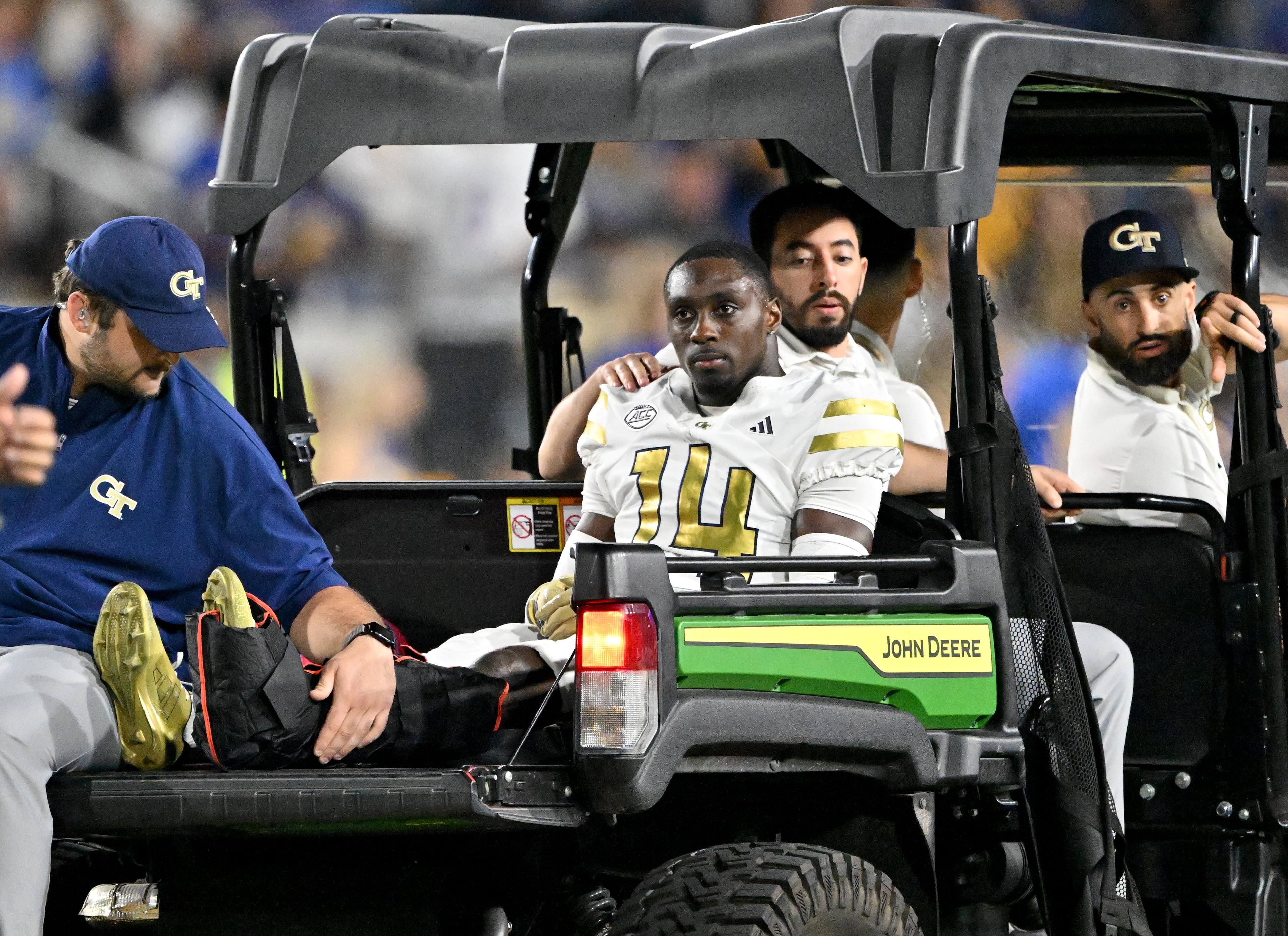 Georgia Tech defensive back Jy Gilmore (14) leaves after he got injured during the first half in an NCAA college football game at Bobby Dodd Stadium, Saturday, November 22, 2025 in Atlanta. Pittsburgh won 42-28 over Georgia Tech. (Hyosub Shin / AJC)