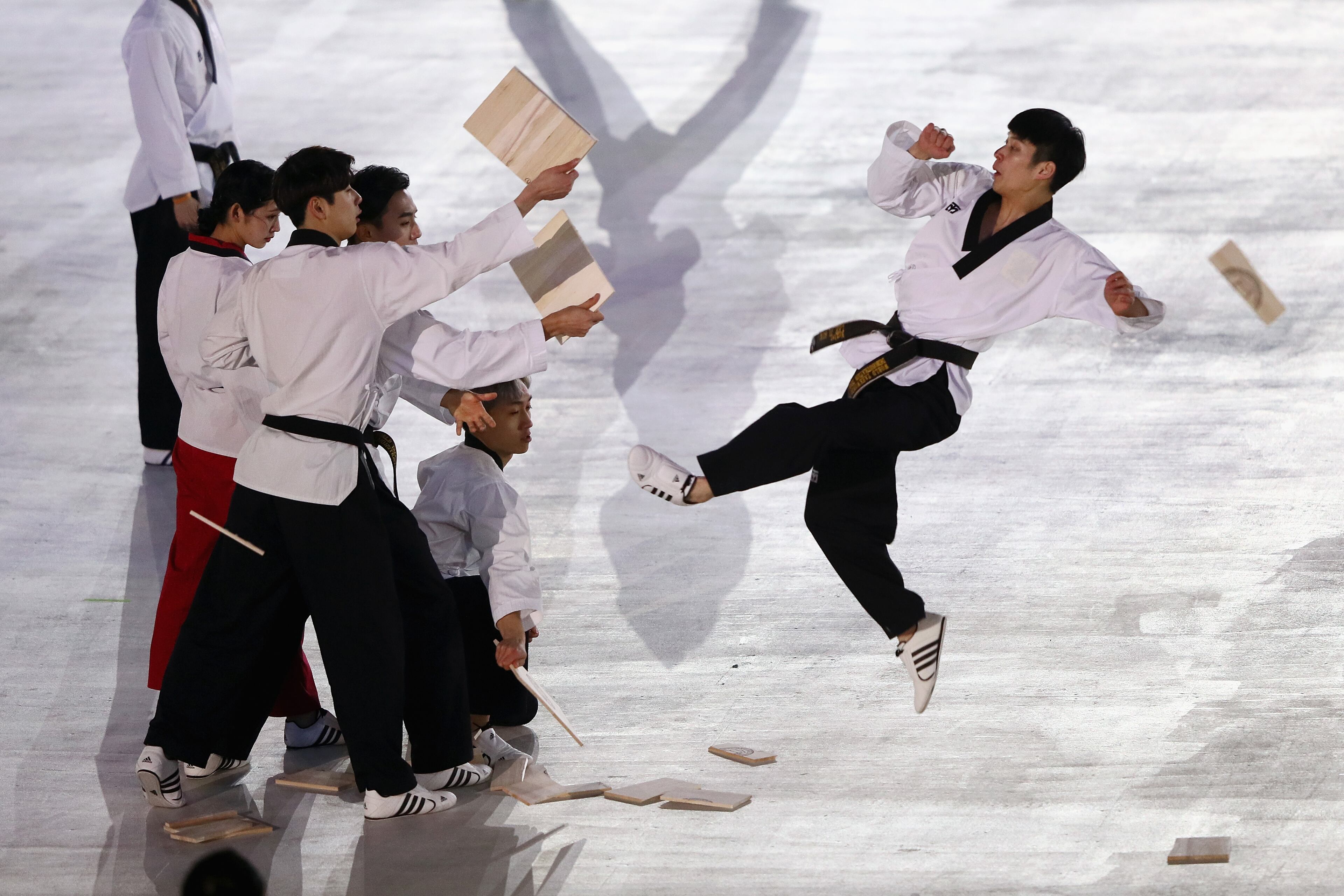 PYEONGCHANG-GUN, SOUTH KOREA - FEBRUARY 09: Korean performers demonstrate martial arts prior to the Opening Ceremony of the PyeongChang 2018 Winter Olympic Games at PyeongChang Olympic Stadium on February 9, 2018 in Pyeongchang-gun, South Korea. (Photo by Jamie Squire/Getty Images)