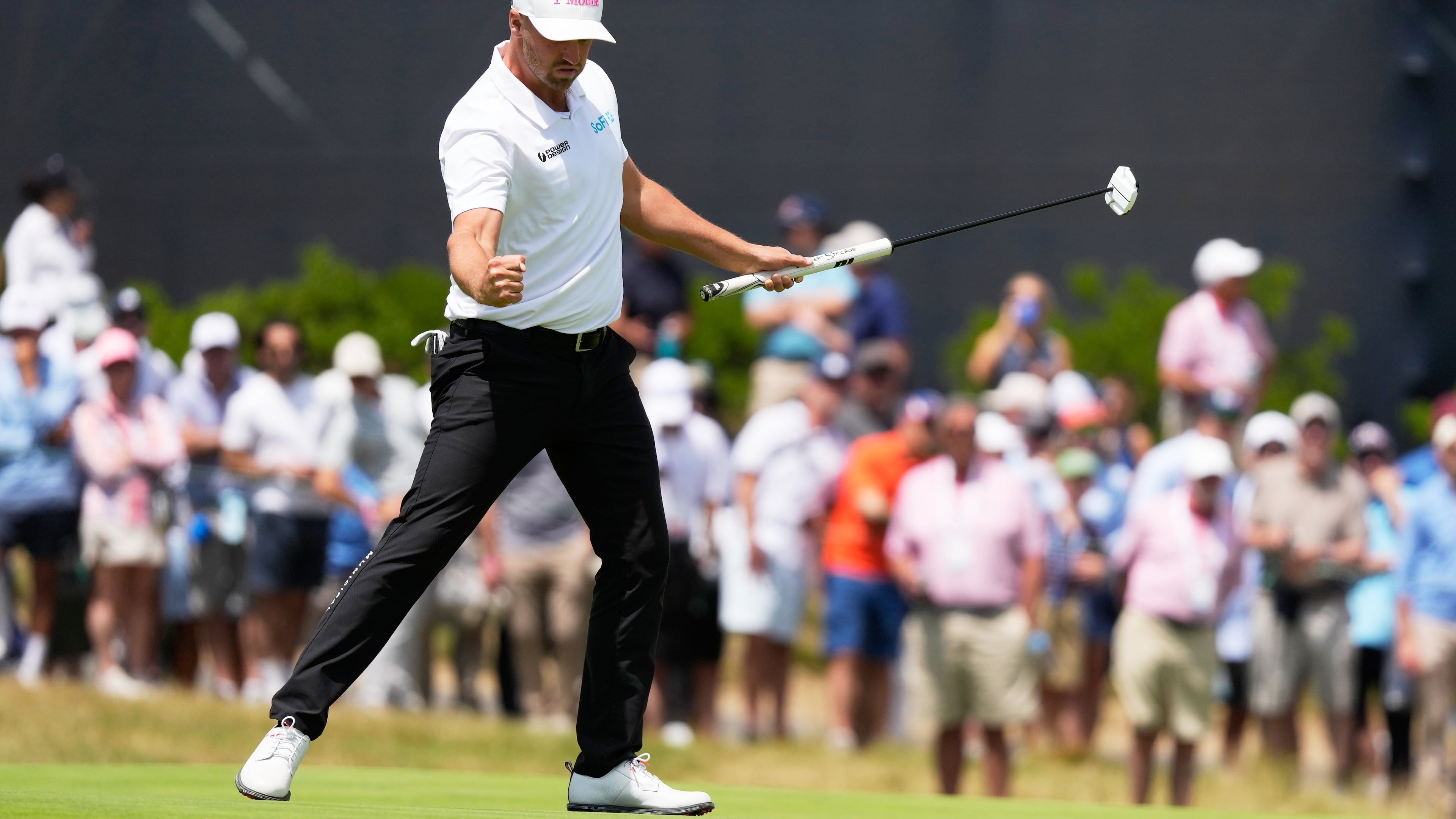 Wyndham Clark celebrates after a birdie on the 13th hole during the second round of the U.S. Open golf tournament at Shinnecock Hills Golf Club in Southampton, N.Y., Friday, June 19, 2026.(AP Photo/Seth Wenig)
