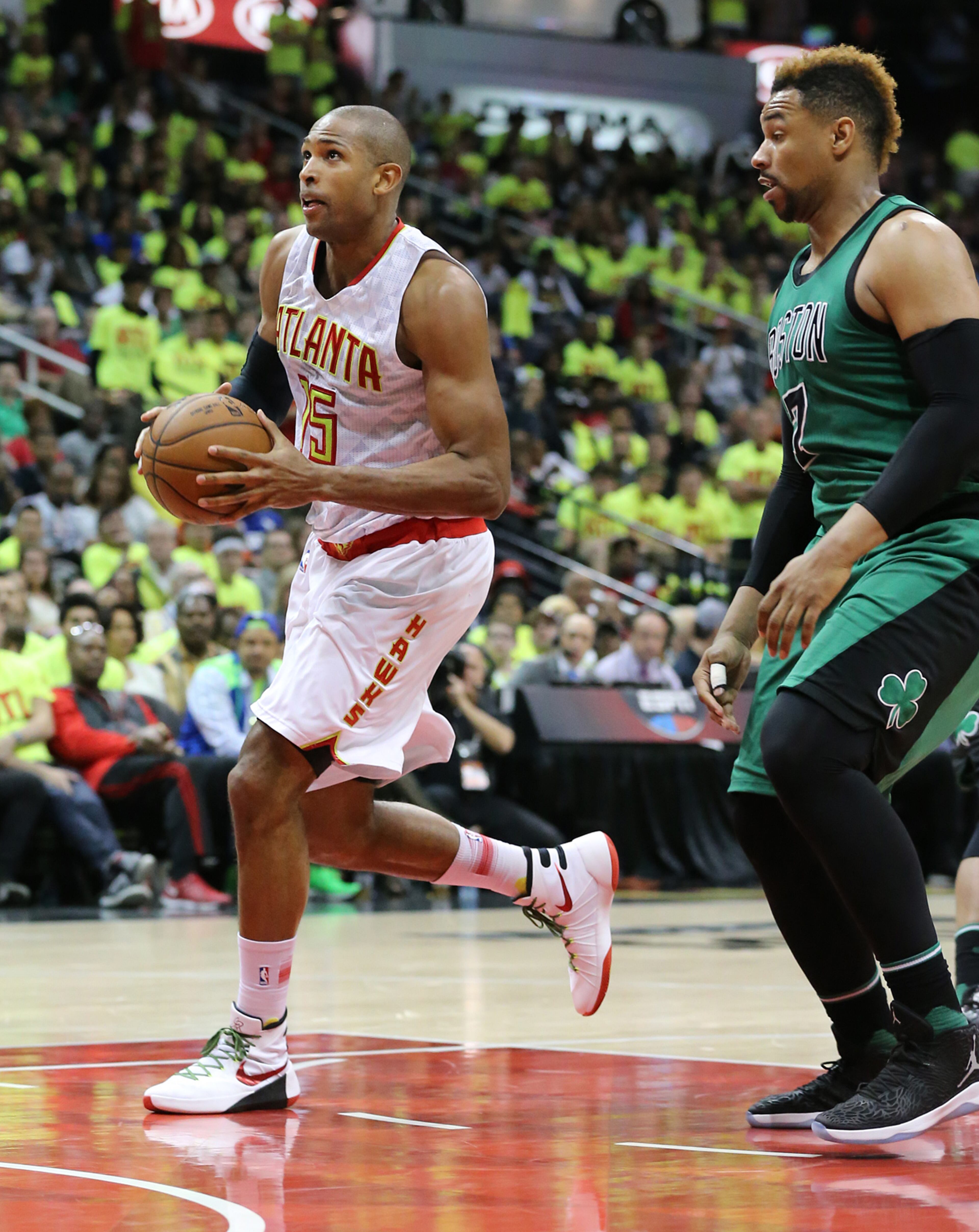 041616 ATLANTA: Hawks Al Horford drives past Jared Sullinger for two of his team high 24-points to beat the Celtics 102-101 in game one of their NBA Eastern Conference first round playoff game at Philips Arena on Saturday, April 16, 2016. Curtis Compton / ccompton@ajc.com