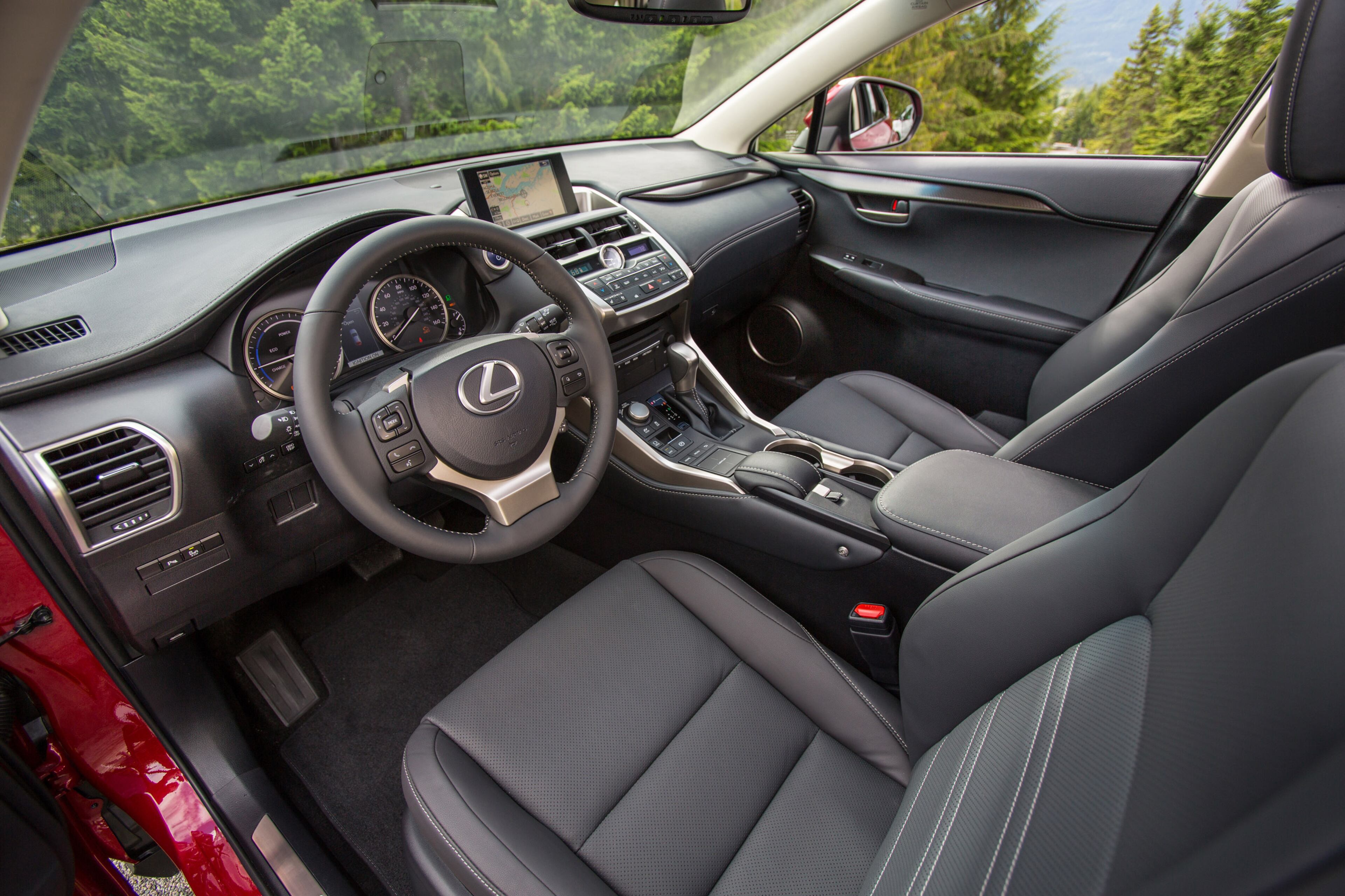 This photo provided by Toyota shows the interior of the 2015 Lexus NX 300H SUV. The NX debuts with either a turbocharged 2.0-liter four-cylinder engine - the first turbocharged engine in a Lexus - or a hybrid powertrain. The gas engine gets 235 horsepower and is mated to a new six-speed transmission. (AP Photo/Toyota, David Dewhurst Photography)