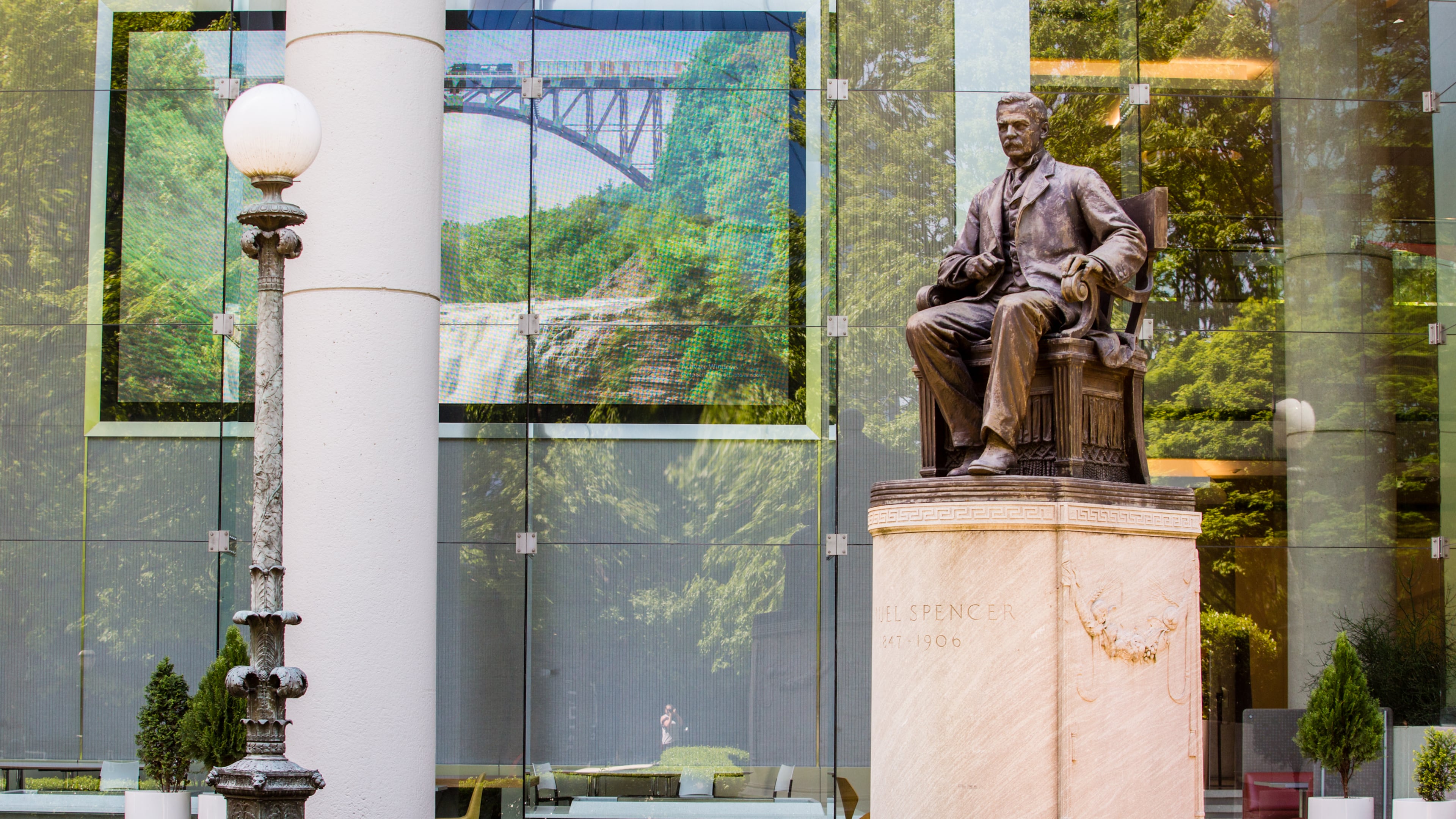 The statue of Samuel Spencer stands in front of the Norfolk Southern building on Peachtree Street on Tuesday, April 13, 2021. The city owns the statue and Norfolk Southern is asking permission to store the confederate monument of their first president, until they decide what to do with it. (Jenni Girtman for The Atlanta Journal-Constitution)